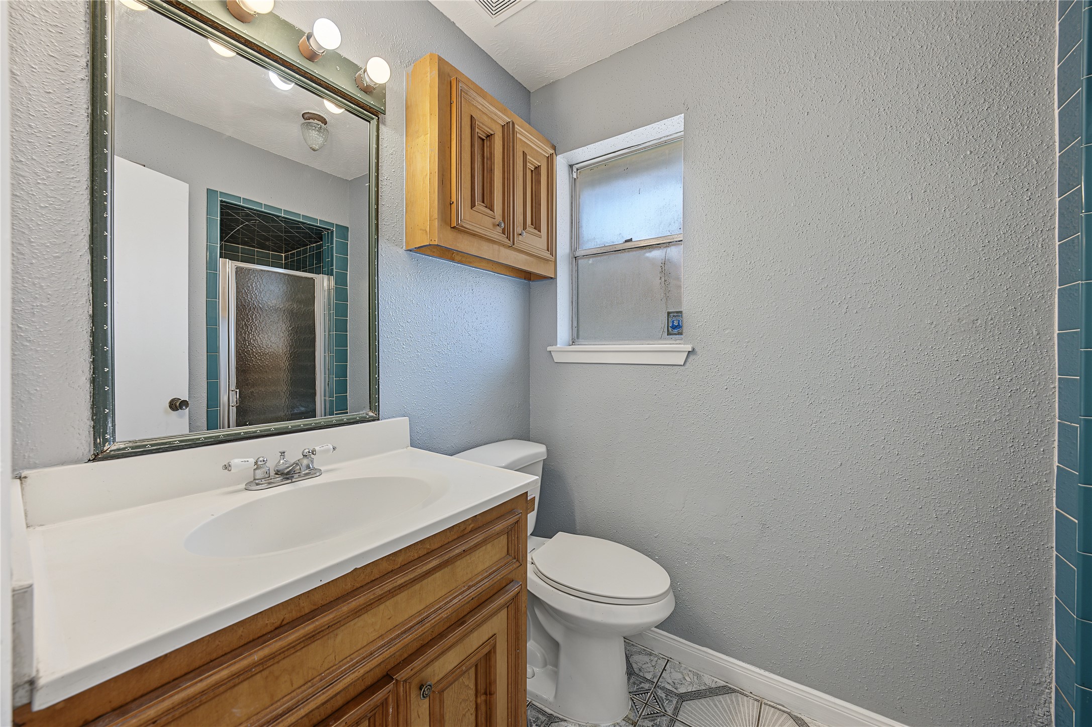 Full bathroom featuring a functional layout, fresh interior paint, and clean finishes.