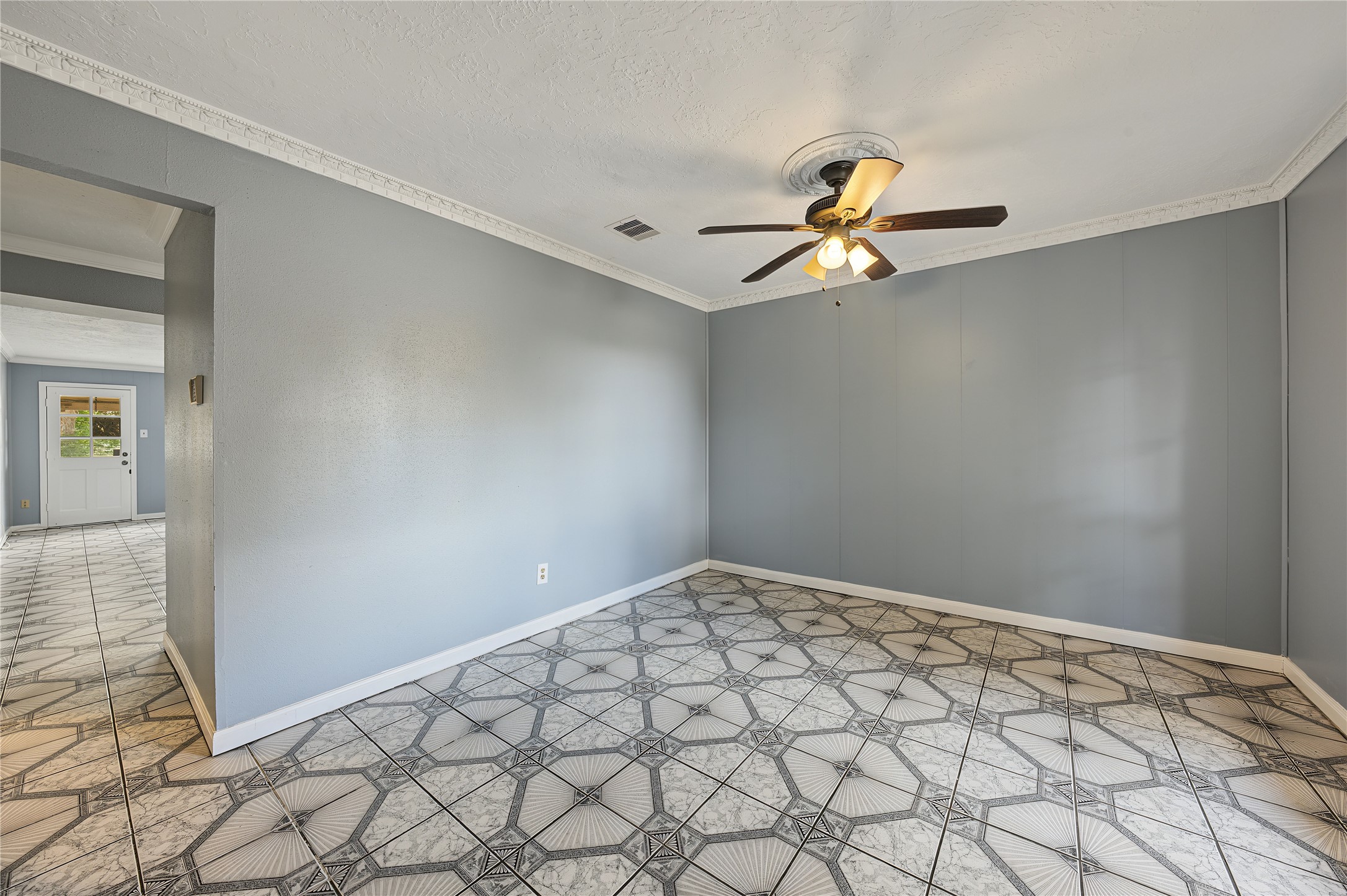 Bright living area featuring fresh interior paint and great natural light.
