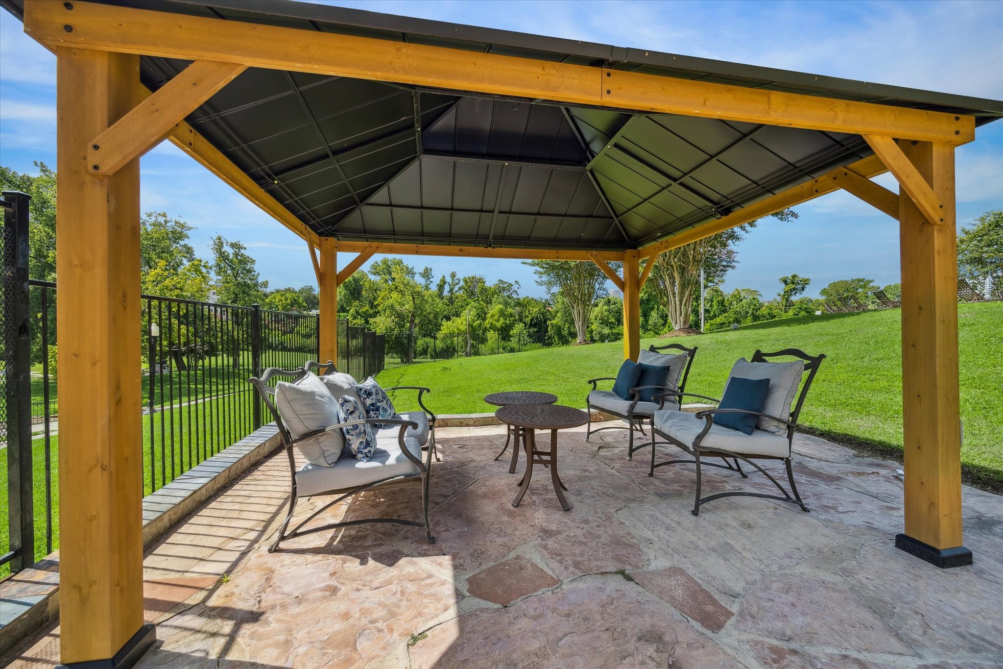 Cover outdoor sitting by the outdoor kitchens.