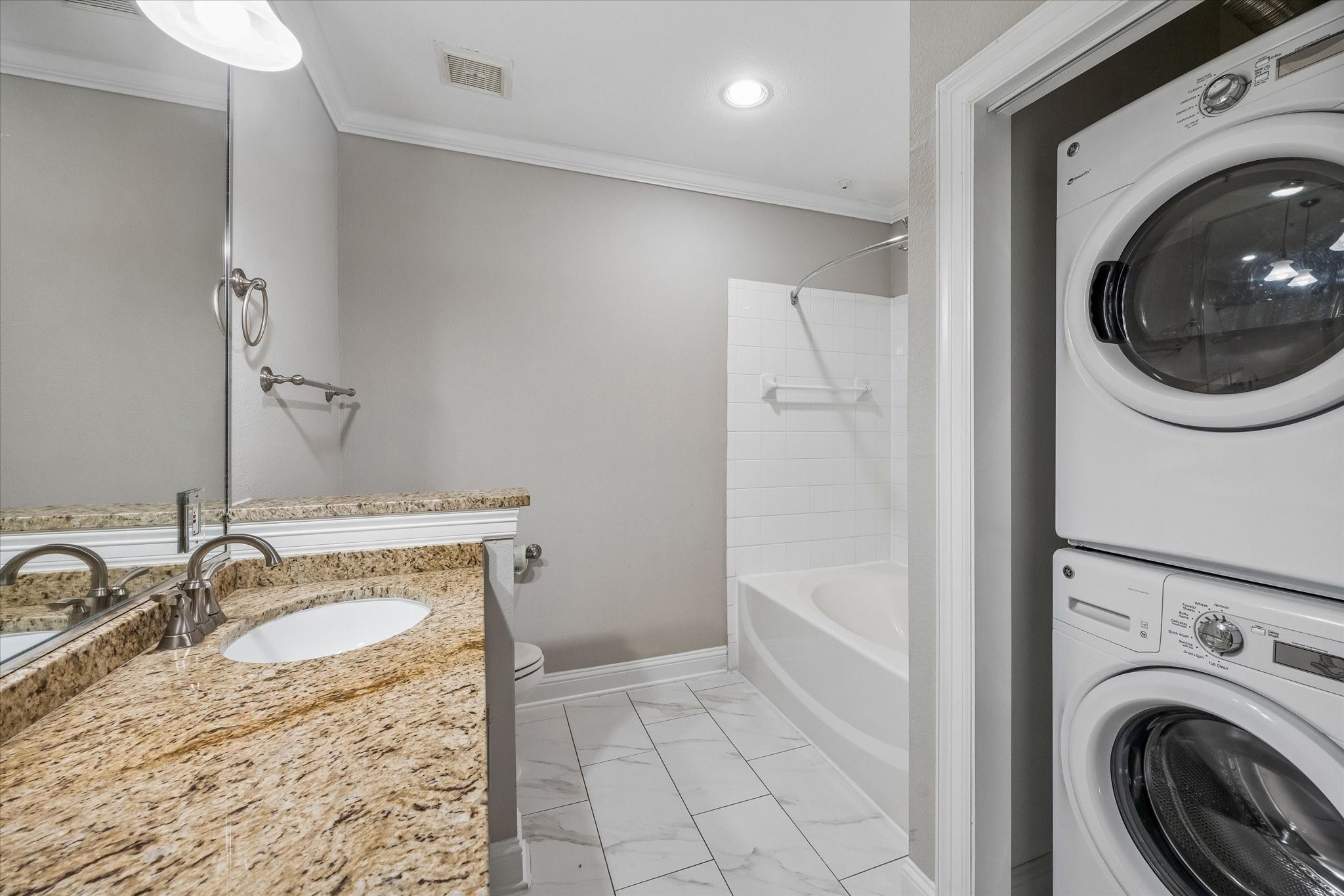 Full size stackable washer & dryer.