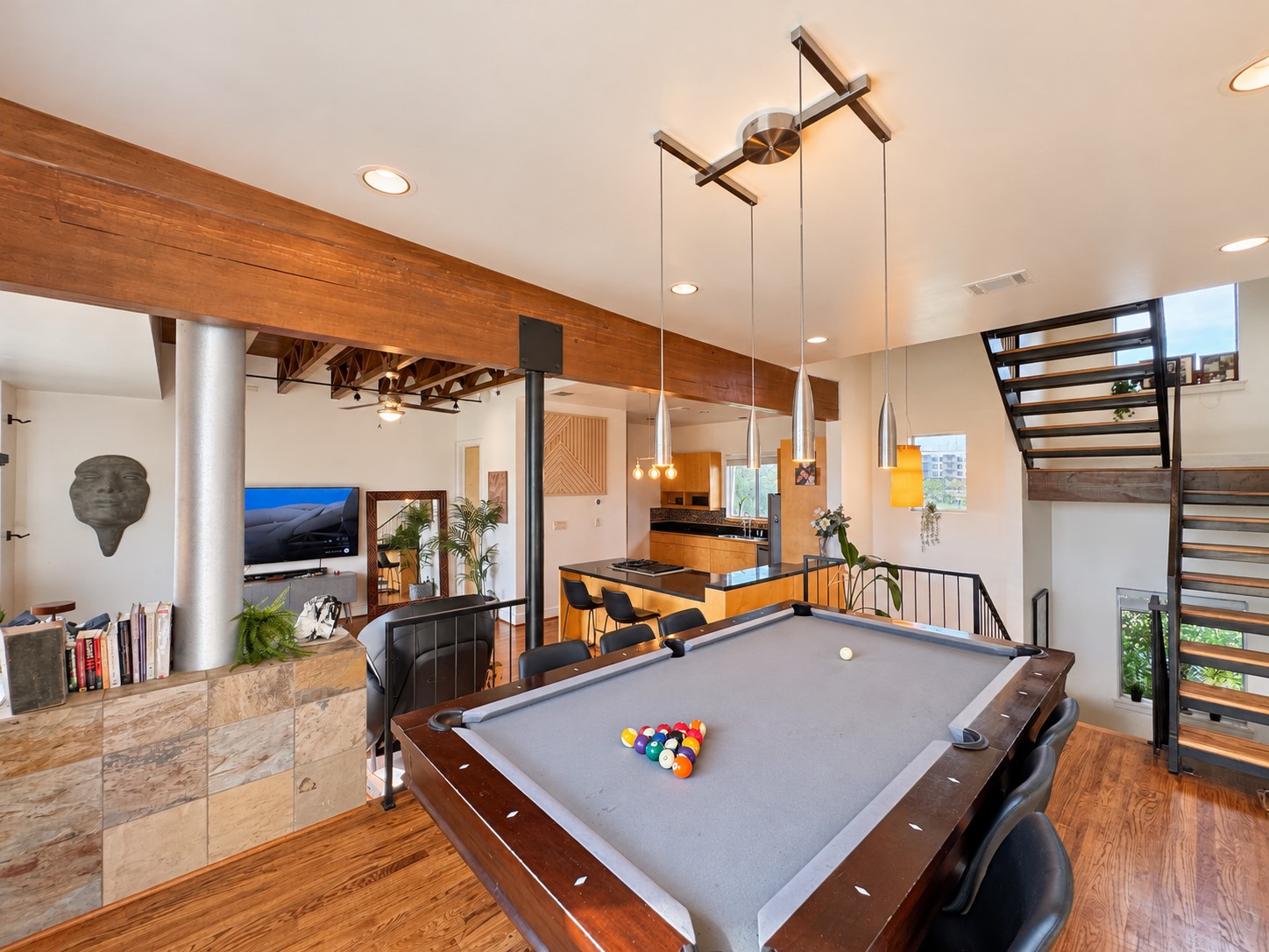 Dedicated entertainment area featuring a pool table, perfect for game nights and hosting friends.