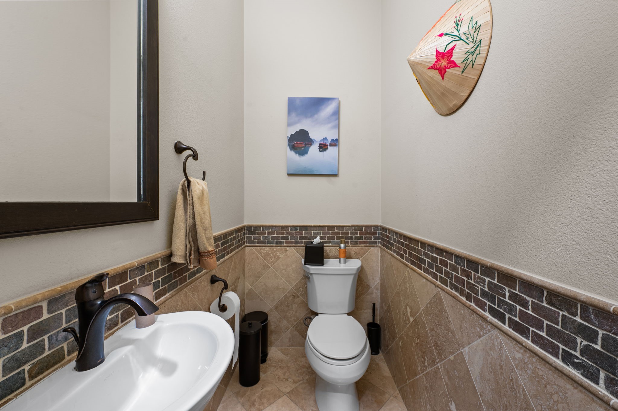 The half bath is also located on the 2nd floor, so guests have convenient access from the common area of the Living, Dining Room and Kitchen.