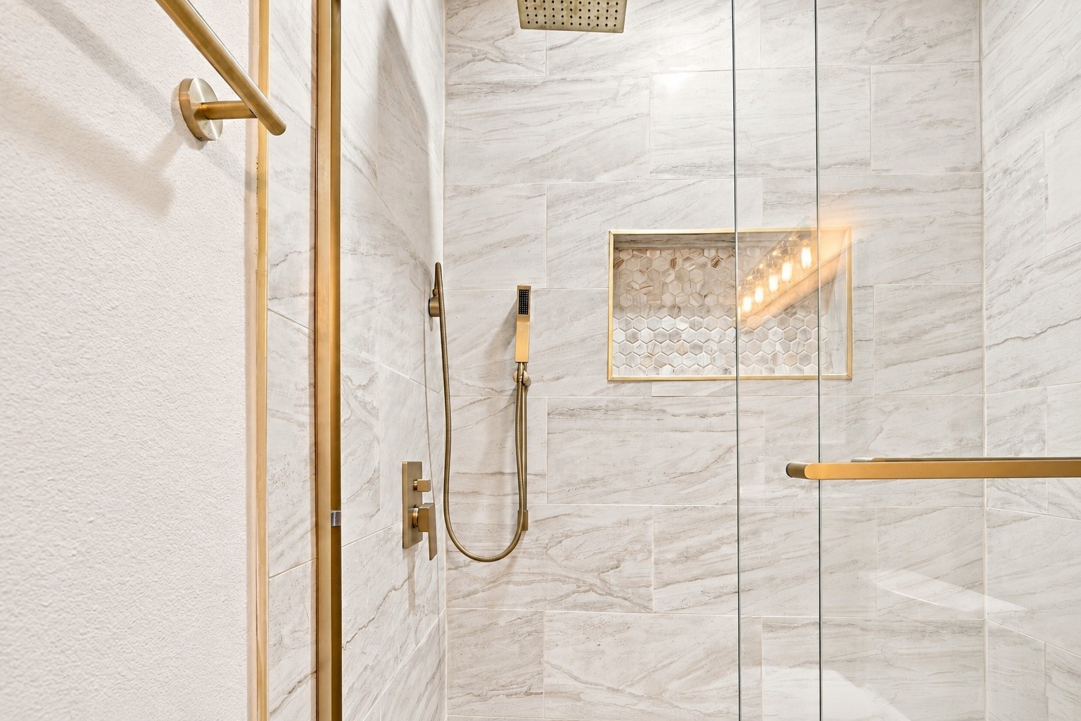 Updated Plumbing Fixtures in the walk in shower!