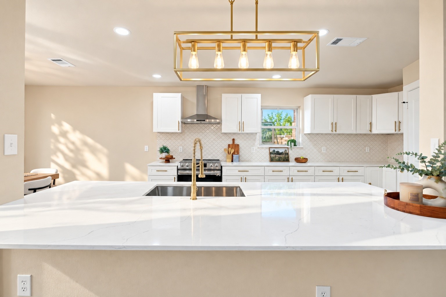 A view of the kitchen island with updated Quartz Countertops!