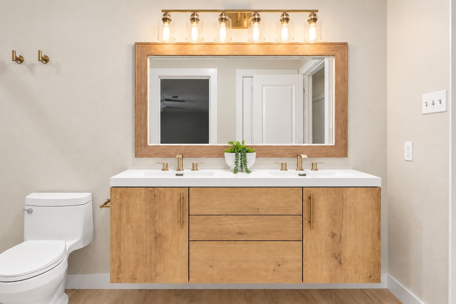 The floating vanity in the primary bathroom with dual sinks!