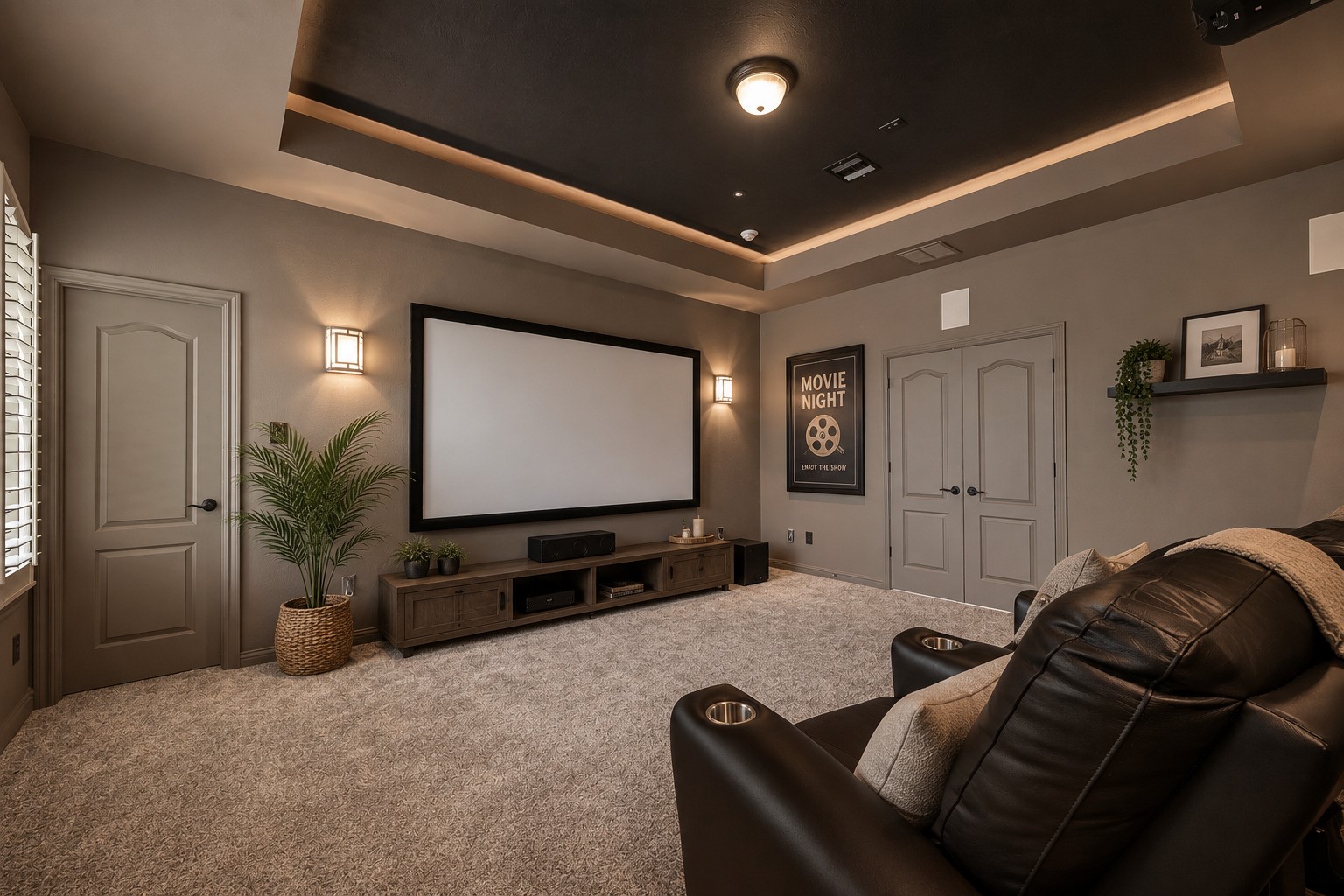 The dedicated media room is designed for entertainment and relaxation, featuring a dark tray ceiling with ambient LED accent lighting and wall sconces that create a theater like atmosphere. Plush carpeting adds comfort, while plantation shutters and double door closets provide both light control and storage. This versatile space is perfect for movie nights or gaming sessions with loved ones. Please note, this photo has been virtually staged.