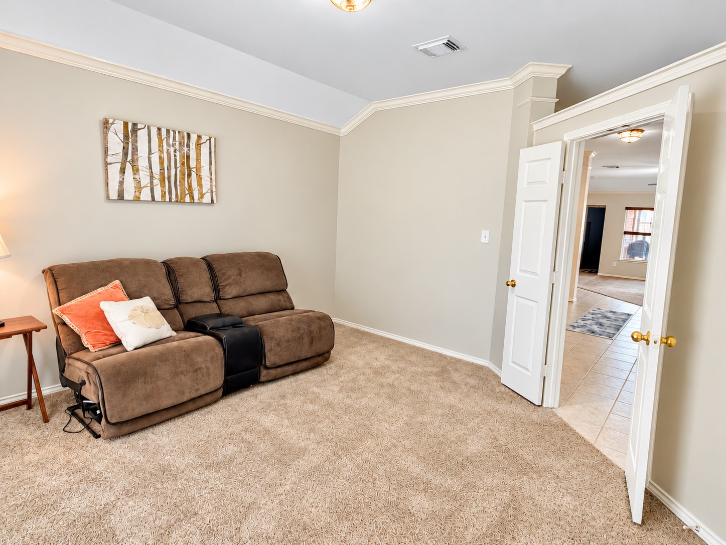 Entering the front room.  It has double doors and is great for a quite space, kids playroom or even a home study.
