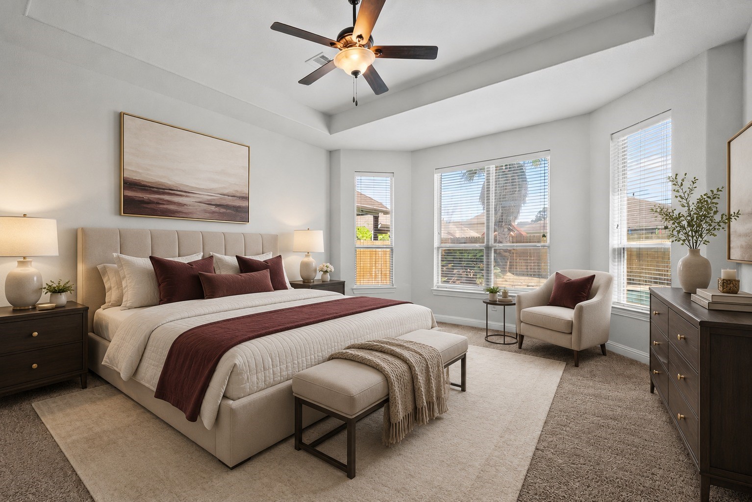 Virtually Stagged - Spacious primary suite features a striking bay window alcove, tray ceiling, and plush carpet, a bright, relaxing retreat to call your own!