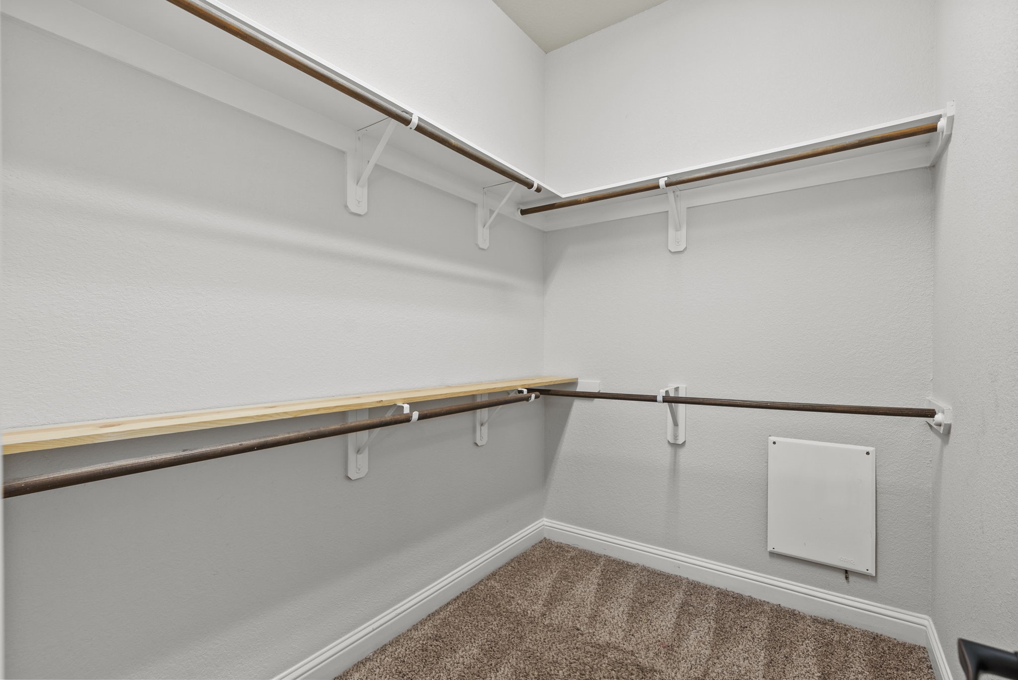 Spacious walk-in closet offers ample double-hung rod storage, plenty of room to organize your entire wardrobe with ease!
