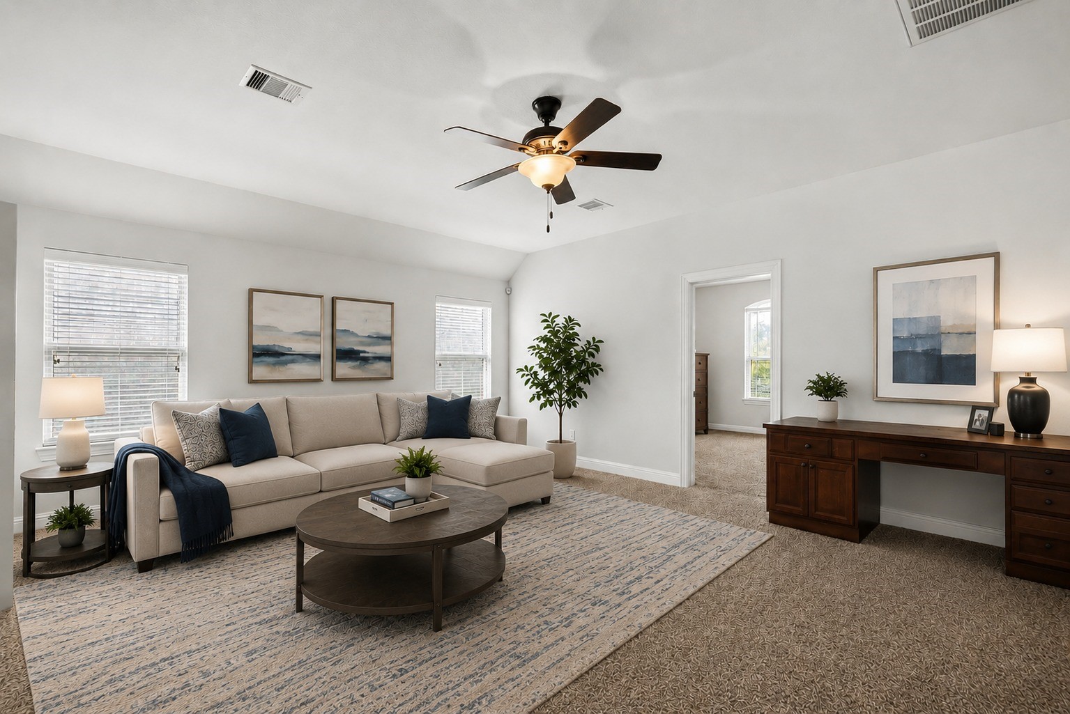 Virtually Stagged - Generously sized upstairs bonus room offers cabinetry, plush carpet, and vaulted ceilings, ideal as a game room, or office.