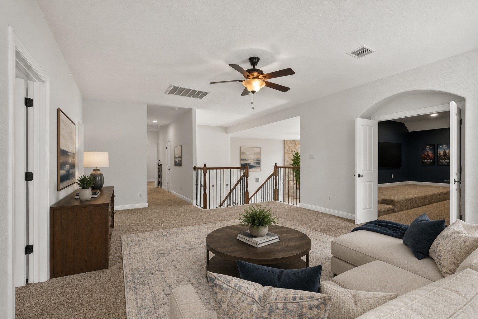 Virtually Stagged - Expansive upstairs game room overlooks the wrought-iron staircase and opens to a theater/media room, endless possibilities for entertainment!
