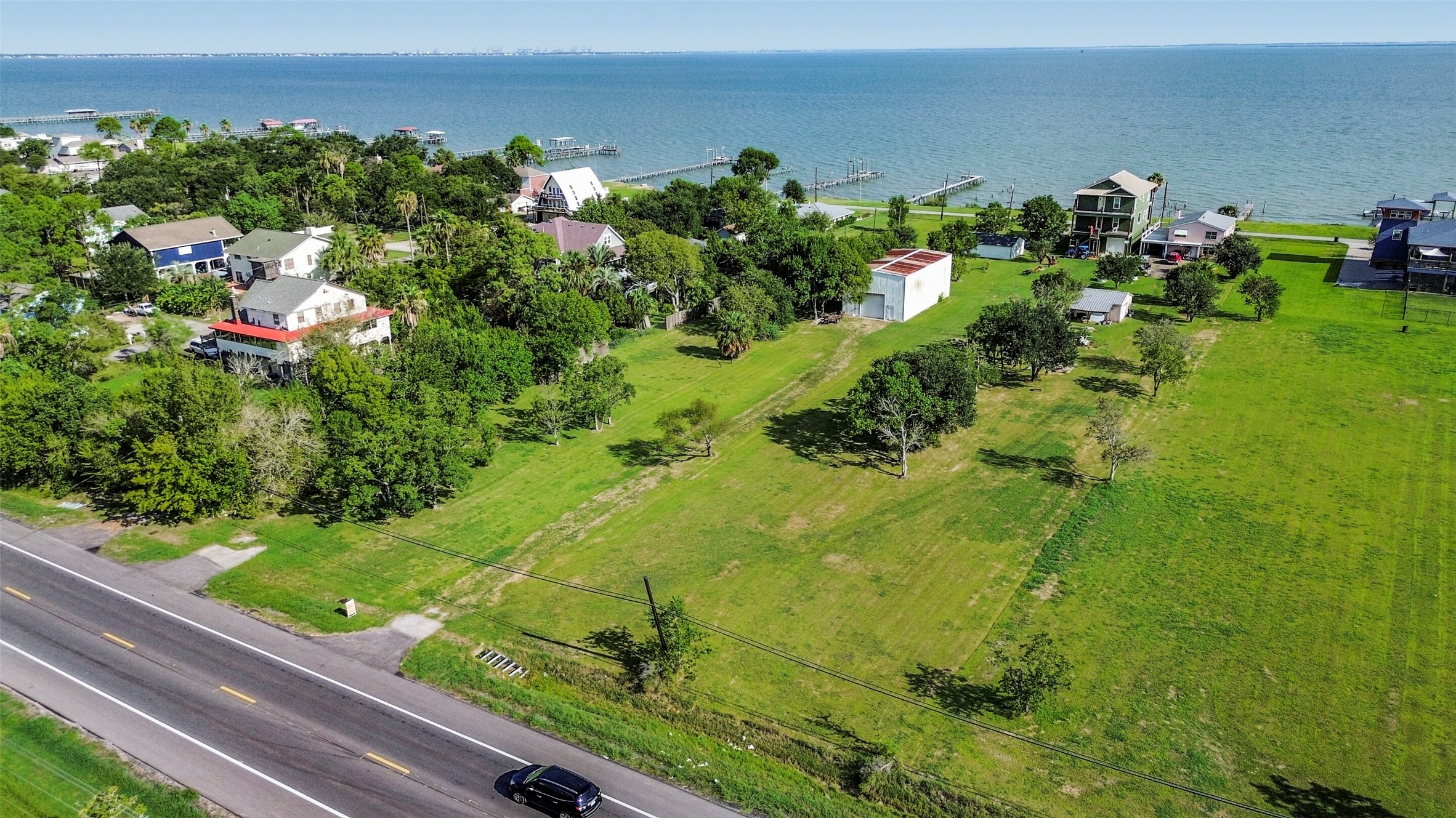 Prime coastal property with sprawling green spaces, and direct access to serene waterfront views, perfect for building your dream home or getaway retreat. Prime coastal property with sprawling green spaces, and direct access to serene waterfront views, perfect for building your dream home or getaway retreat.