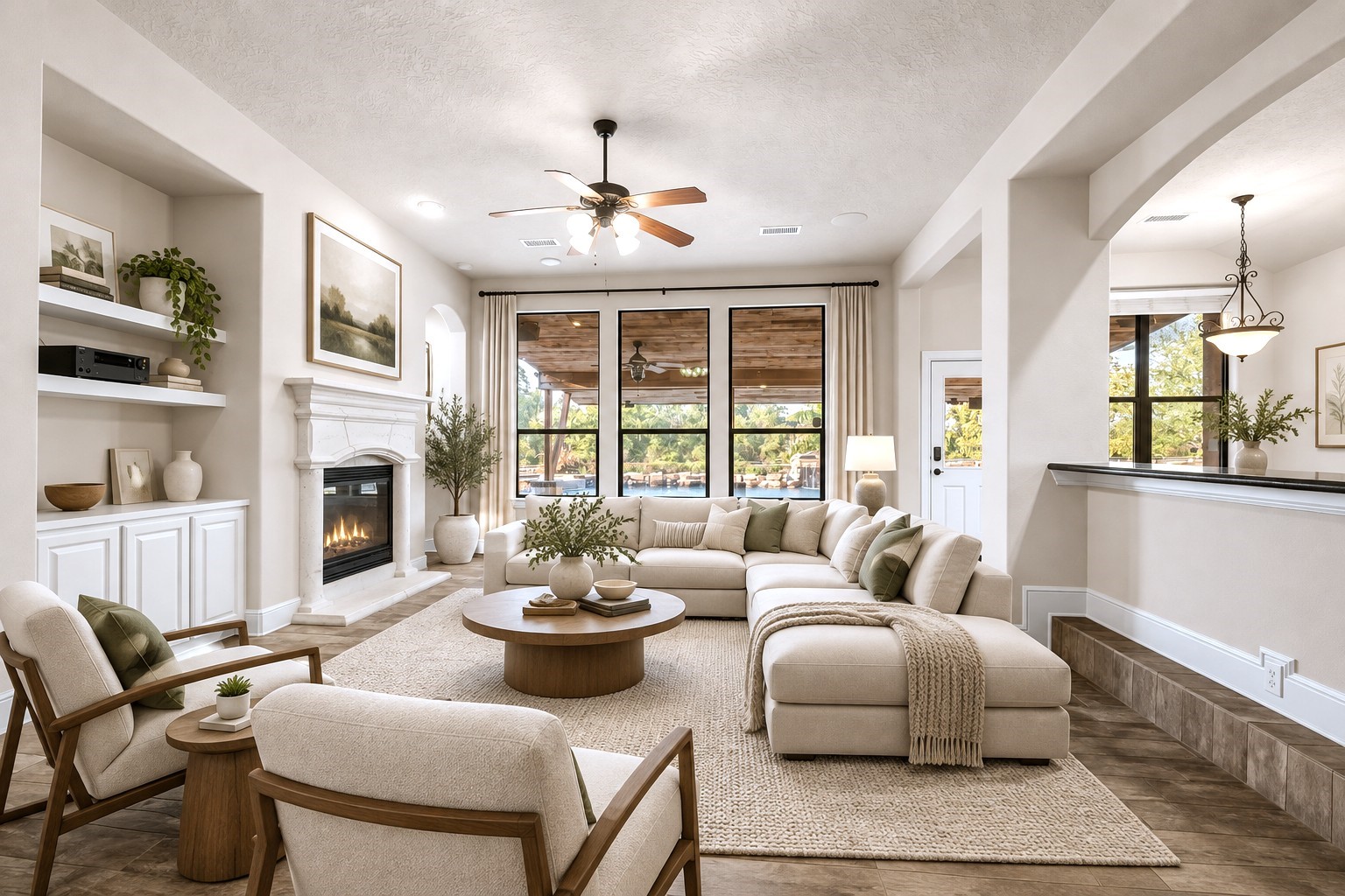 A Living Room Designed to Impress! This gorgeous, light-filled living space features a beautiful fireplace, custom built-ins, and expansive windows overlooking the backyard oasis! The open-concept design flows effortlessly into the kitchen, making it perfect for everyday living and entertaining. Virtually staged to showcase the room's incredible potential!
