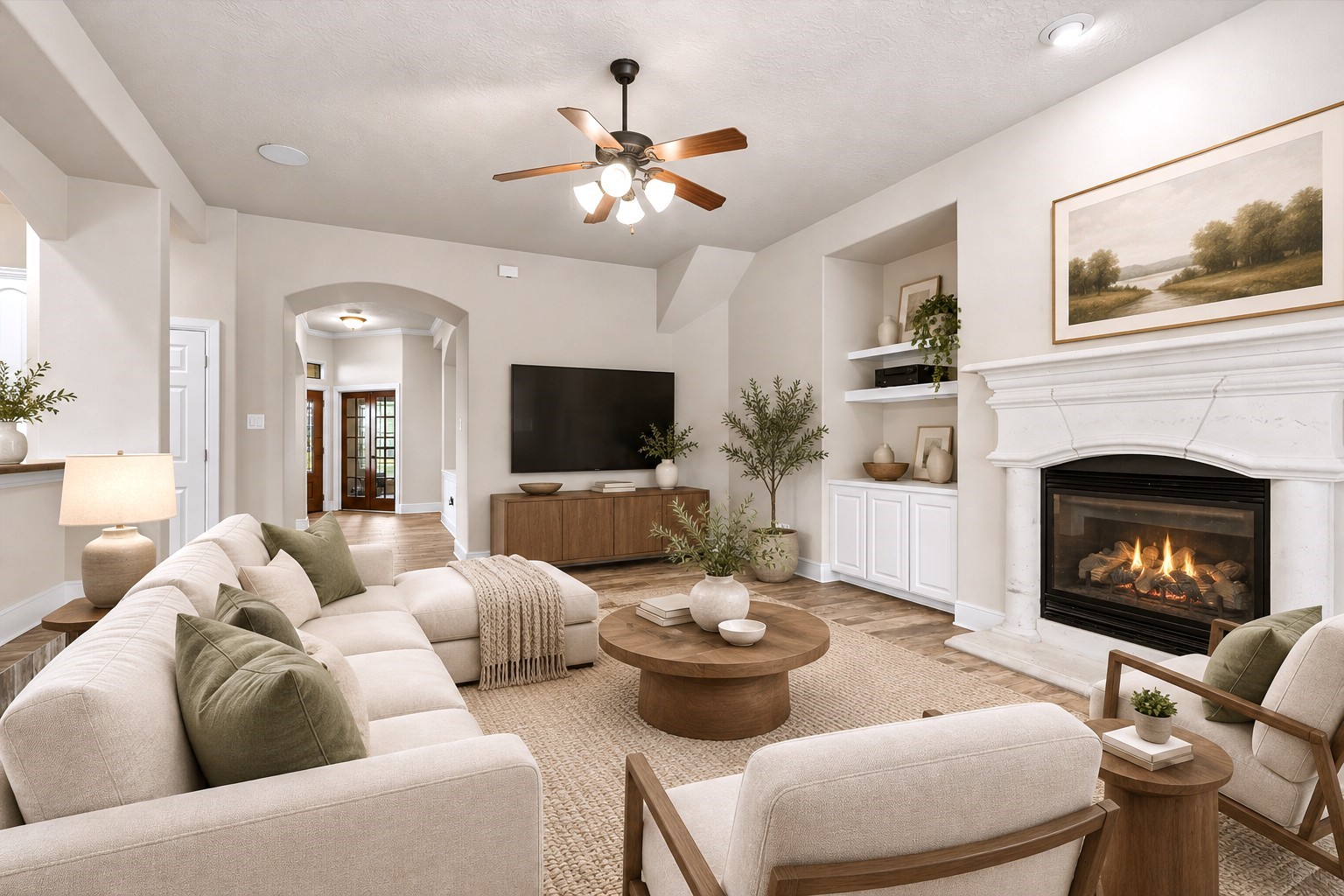 The Heart of the Home! This spacious living room offers the perfect blend of comfort and elegance, featuring a stunning fireplace with an ornate mantel, custom built-ins, gorgeous wood-look tile flooring, and plenty of room to gather! Whether hosting guests or enjoying a cozy night in, this inviting space was designed for making memories. Virtually staged to showcase the room's potential.