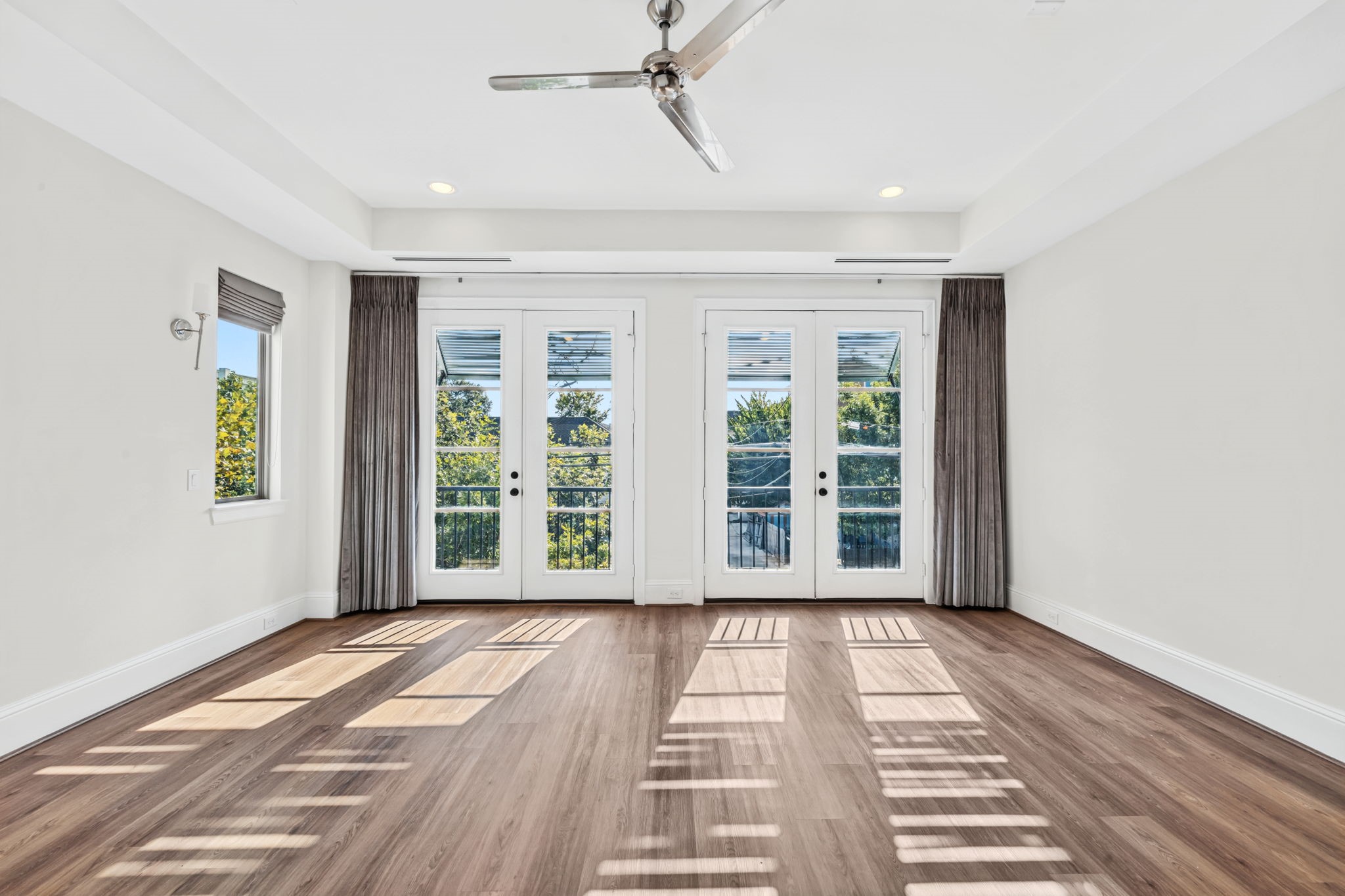 Custom black out curtains and roman shades.