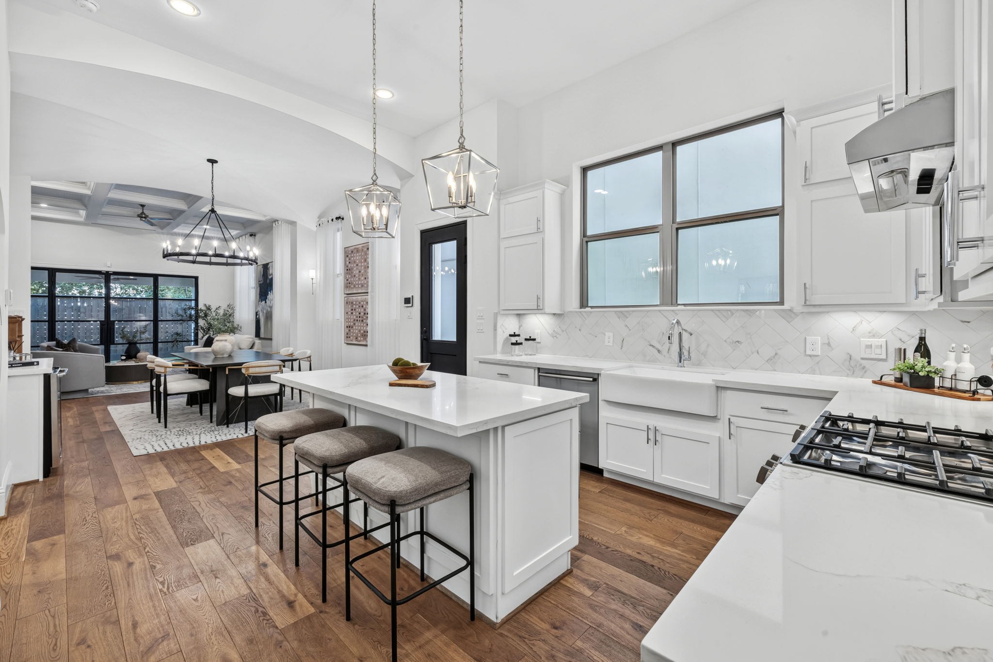 Open concept main floor features a seamless flow between the kitchen, dining, and family roomideal for everyday living and easy entertaining. Open concept main floor features a seamless flow between the kitchen, dining, and family roomideal for everyday living and easy entertaining.