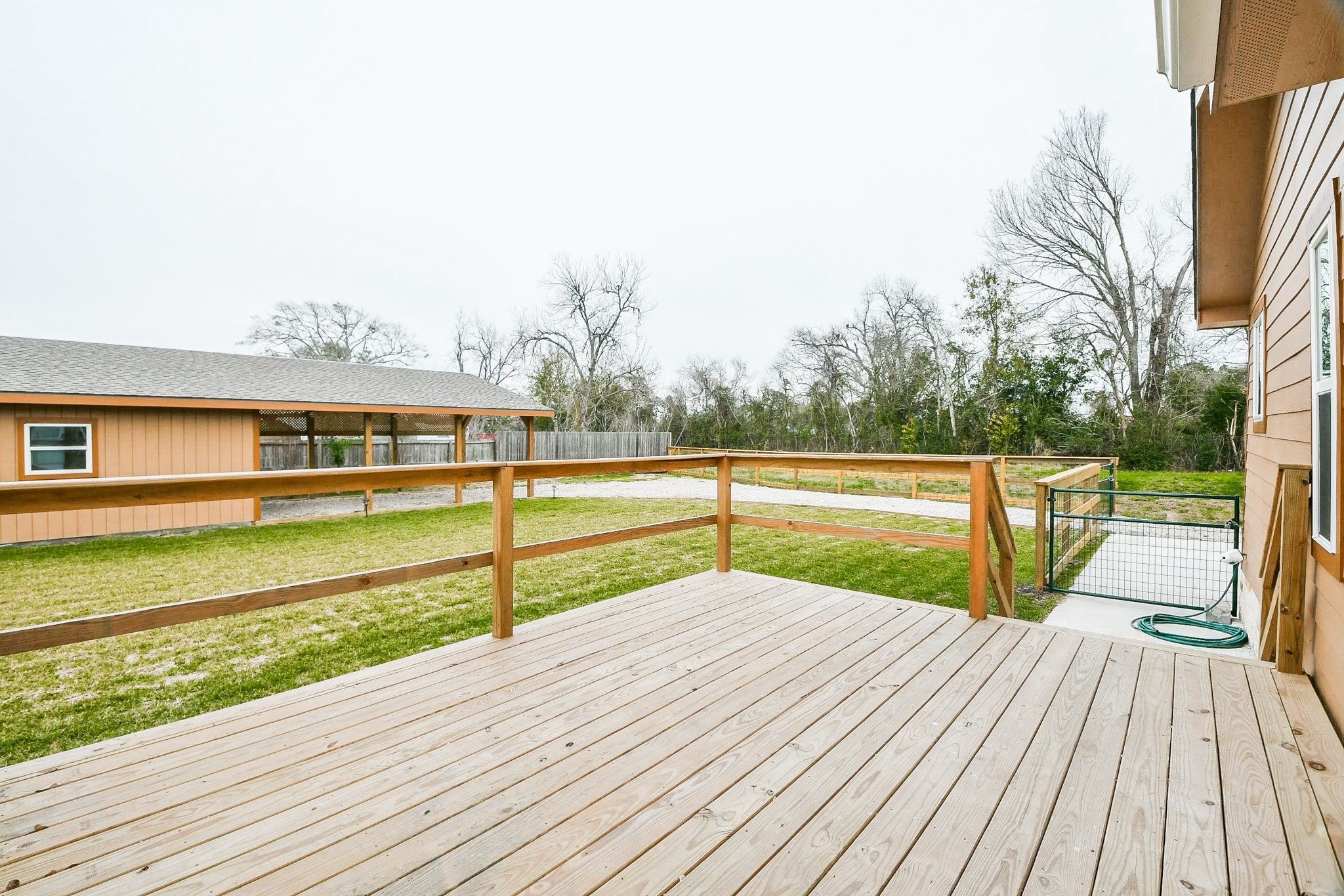 Large back deck is a great place to take in all the great views of the surrounding property