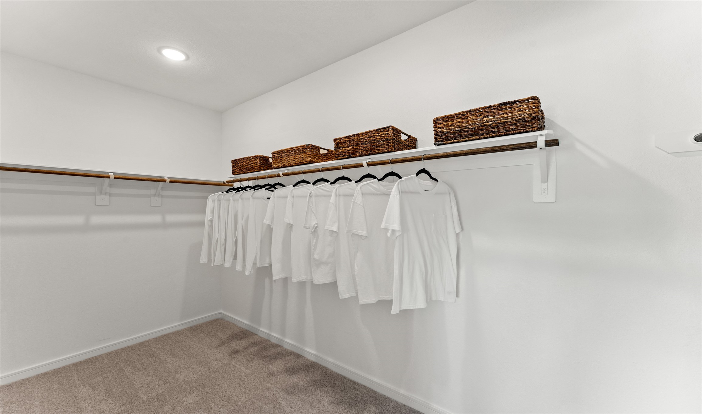 Primary walk-in closet (*Photo not of actual home and used for illustration purposes only.)