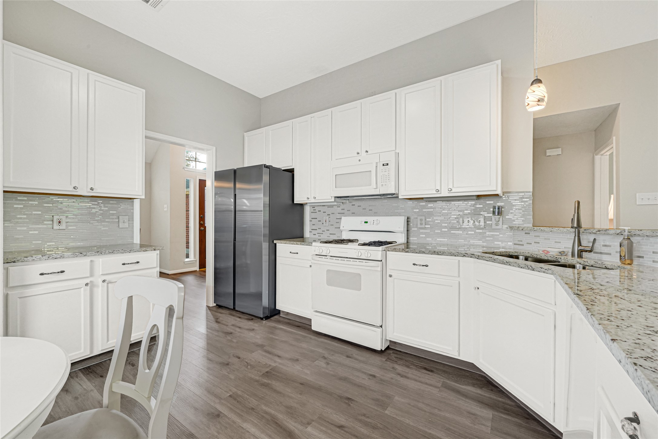 kitchen is open to the living room with access as well to the dining room