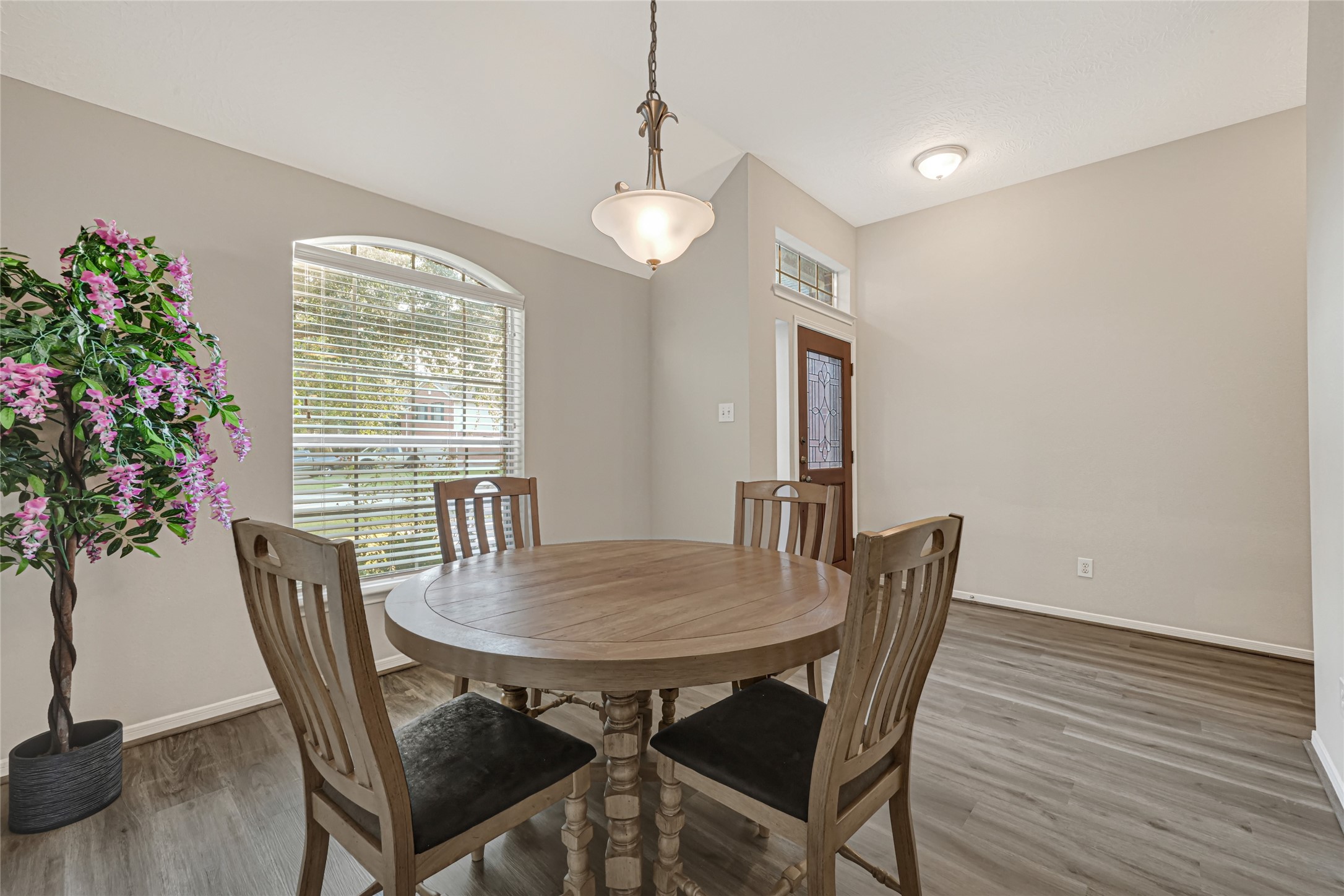 entryway of the home opens to the dining room/optional office area great for working from home
