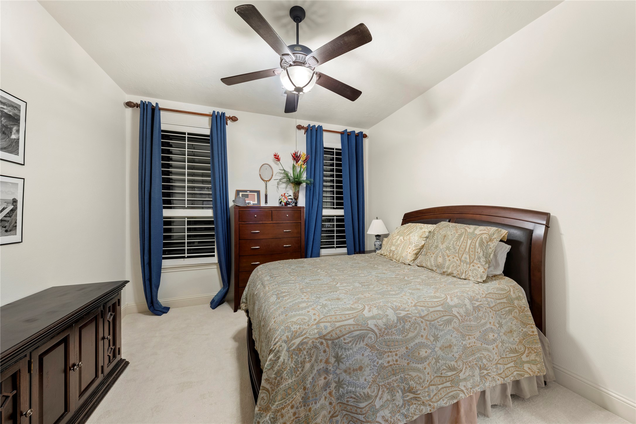 Spacious and inviting, the third secondary bedroom offers a private full bathroom, making it an ideal retreat for guests or your oldest child.