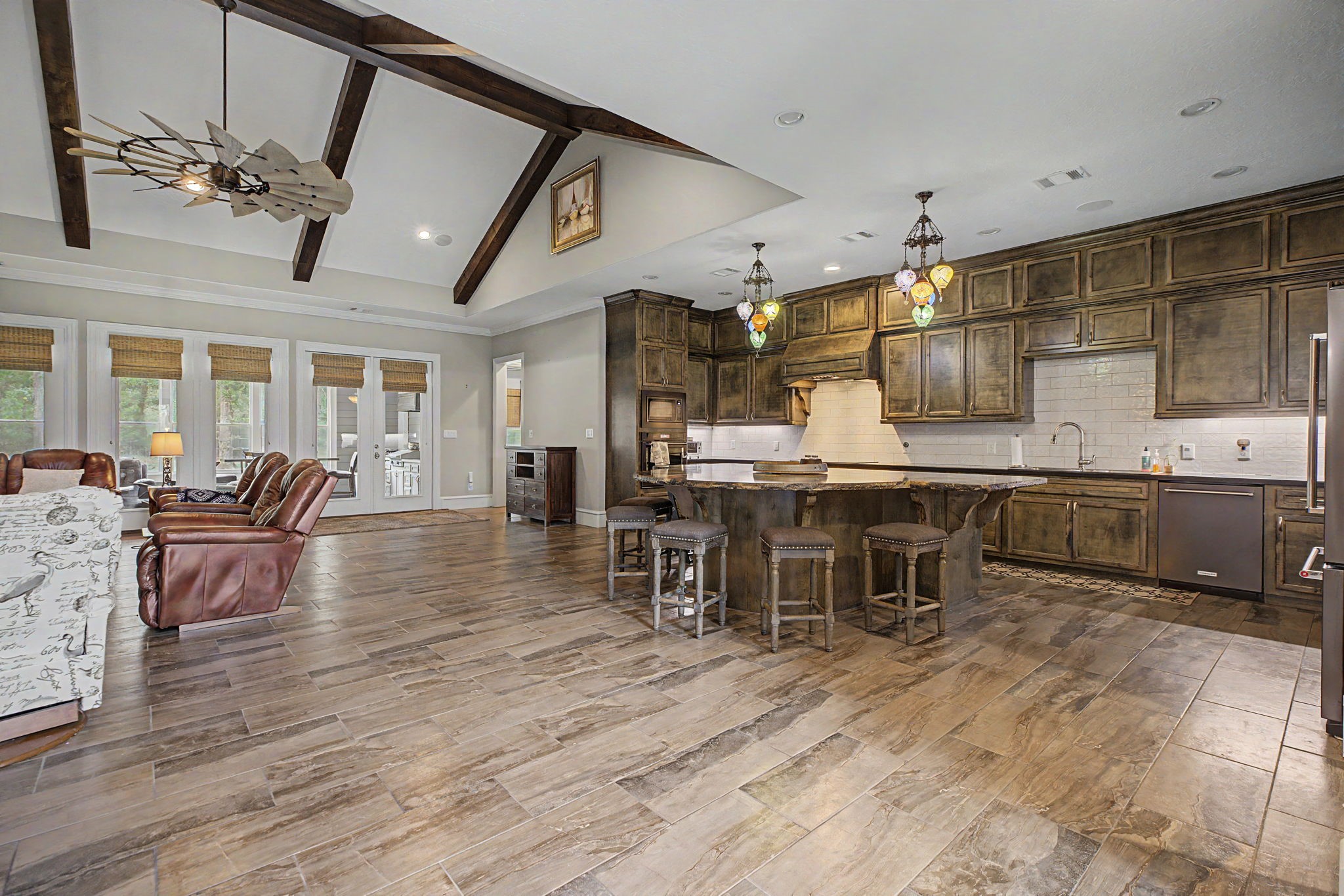 This view from the kitchen looks toward the private primary suite, highlighting the home's desirable split-floor-plan design, with the primary bedroom thoughtfully separated from the secondary bedrooms.