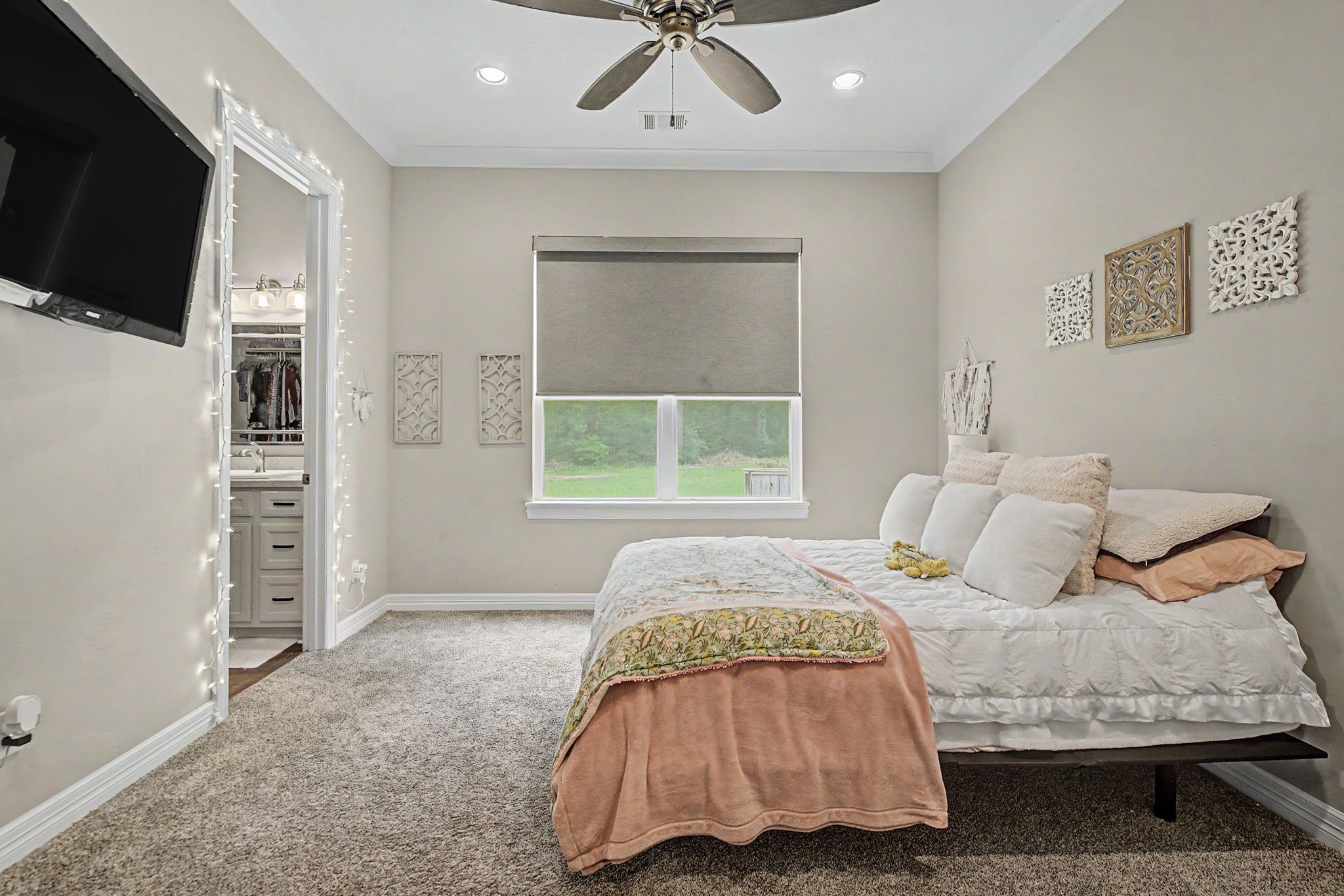 Bright and welcoming, Secondary Bedroom #2 features an ensuite bathroom, large walk-in closet, and plenty of natural light throughout.
