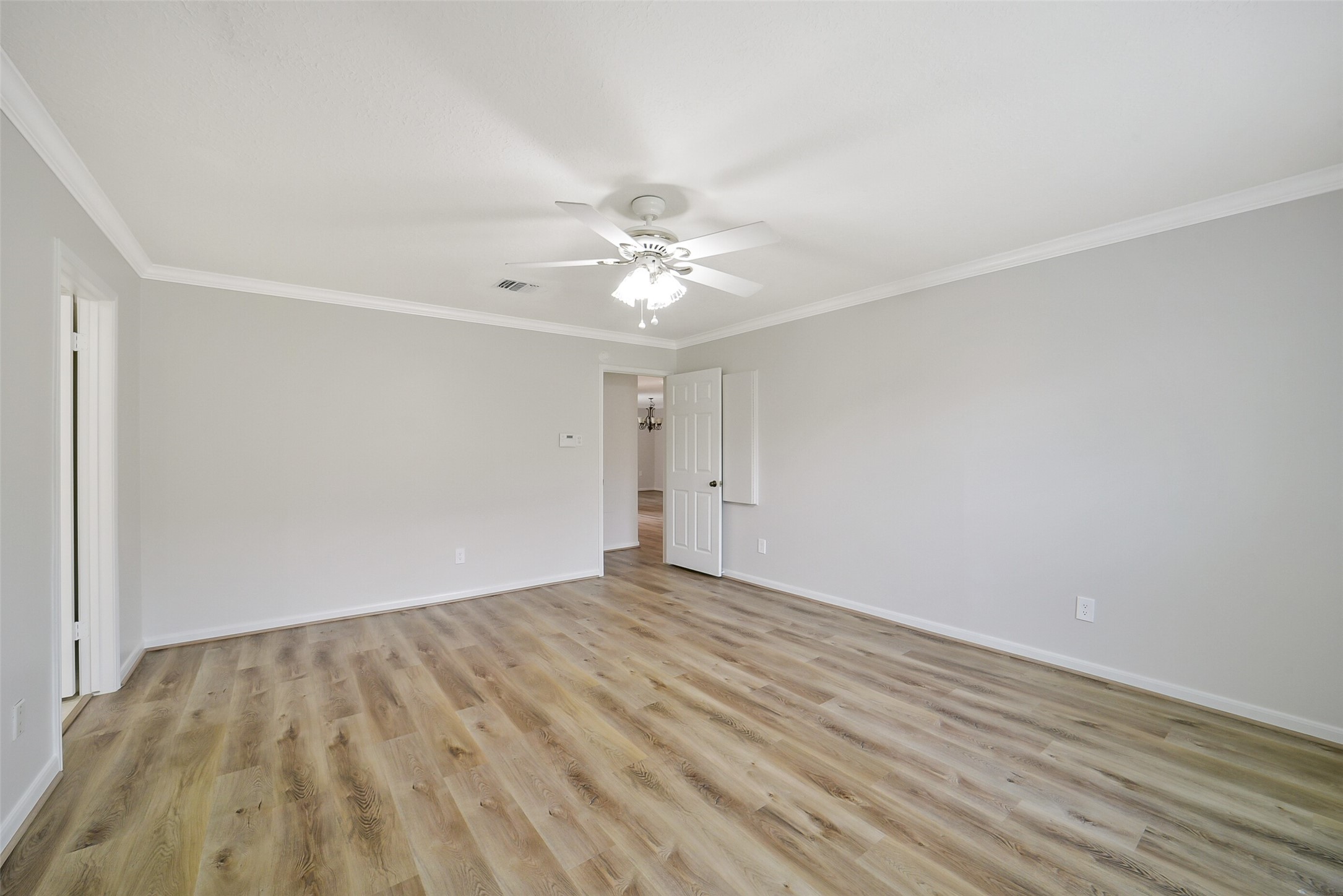 Another view of the primary bedroom.