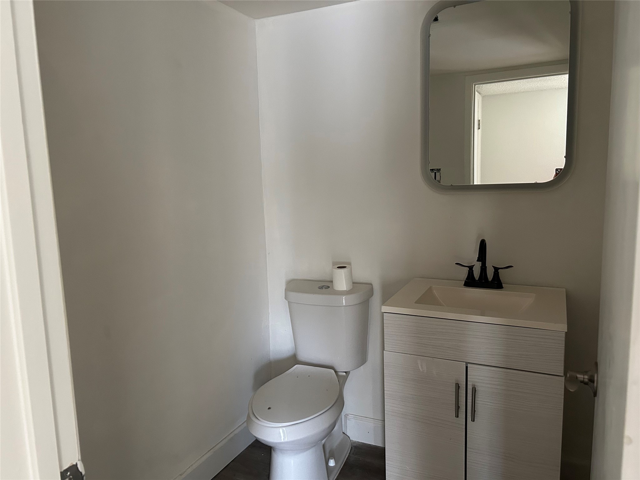 Half bath is conveniently located on the first level