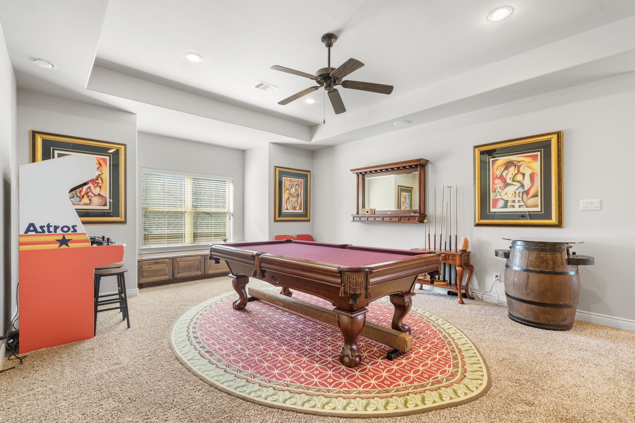 Spacious upstairs game room offers plenty of room for a pool table, arcade games, and entertaining.
