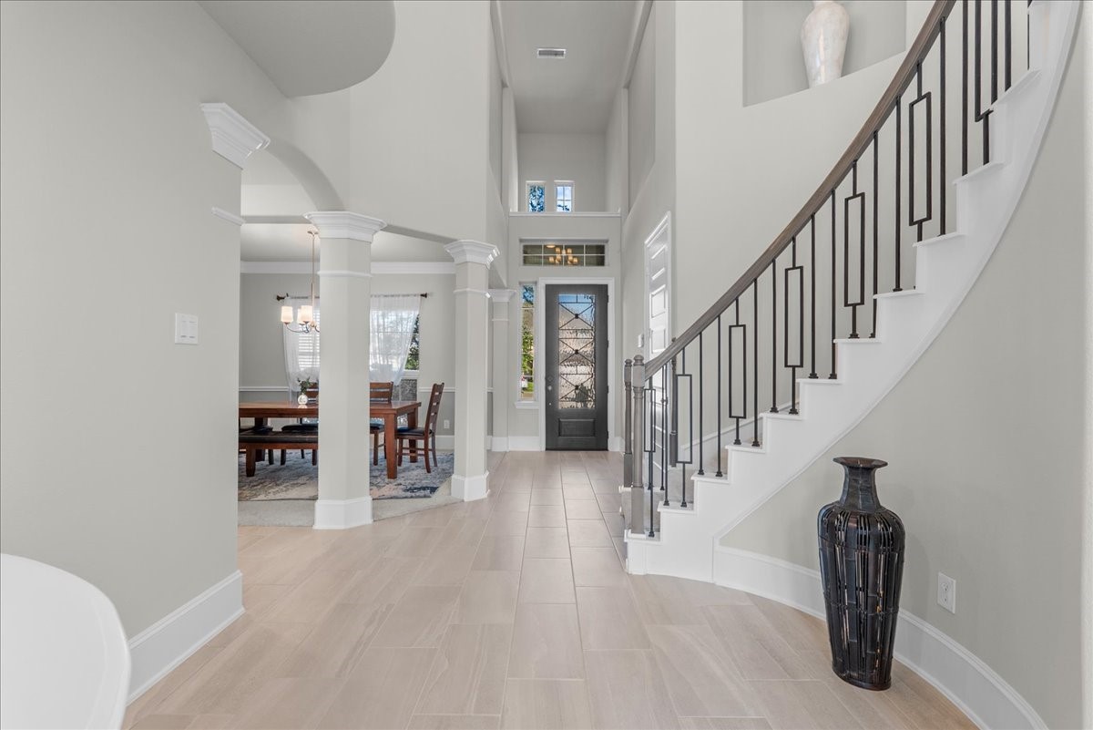 Entrance with spiral staircase