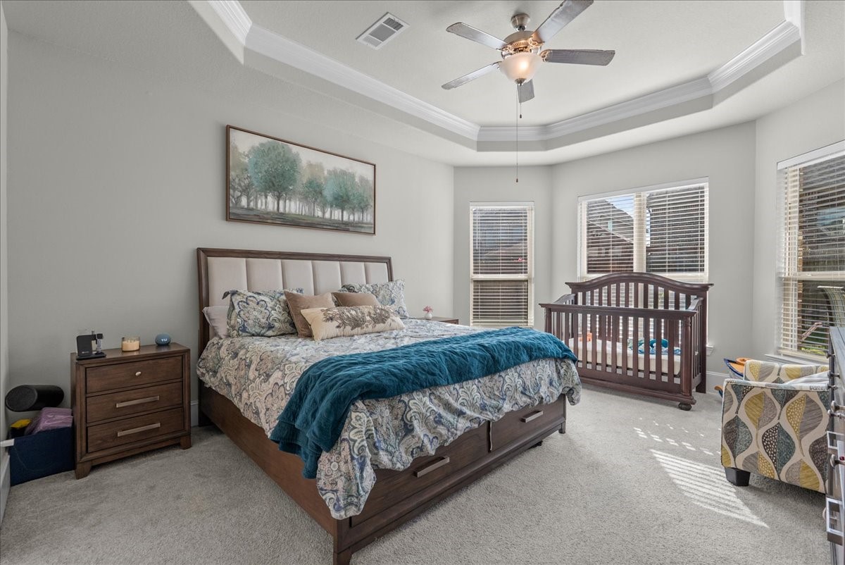 Primary room with vaulted ceilings