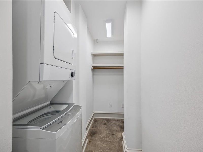 Room to organize and space to work! Two large walk-in closets offer generous storage, including one within the laundry room, where a second built-in desk occupies a handy back nook. The other closet features double hanging rods to maximize wardrobe space.