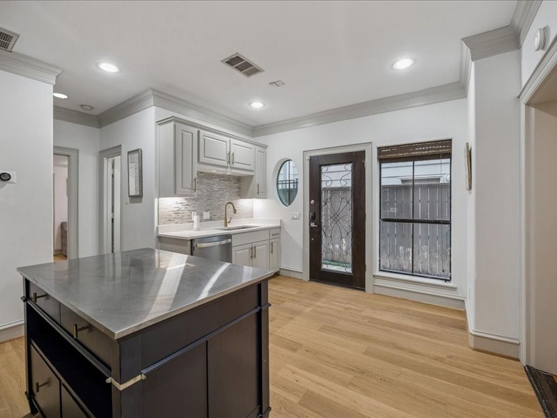Step inside to the heart of your home! The centrally located kitchen connects to the living room and bathroom on one side, with the dining area and garage on the othera convenient layout for everyday living and easy entertaining.