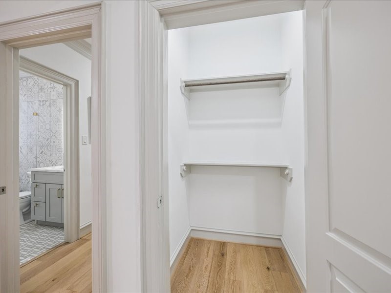 Smart design meets everyday convenience! This built-in workspace in the living area features a stainless steel beverage fridge and plenty of extra storage. Thoughtful built-ins keep essentials organized while reducing the need for additional furniture.