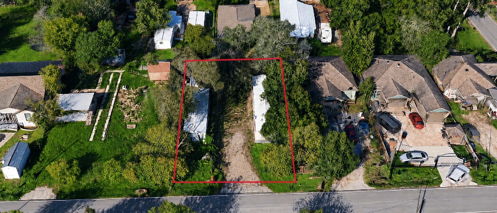 Aerial view highlighting the propertys approximately 76 ft x 110 ft lot.