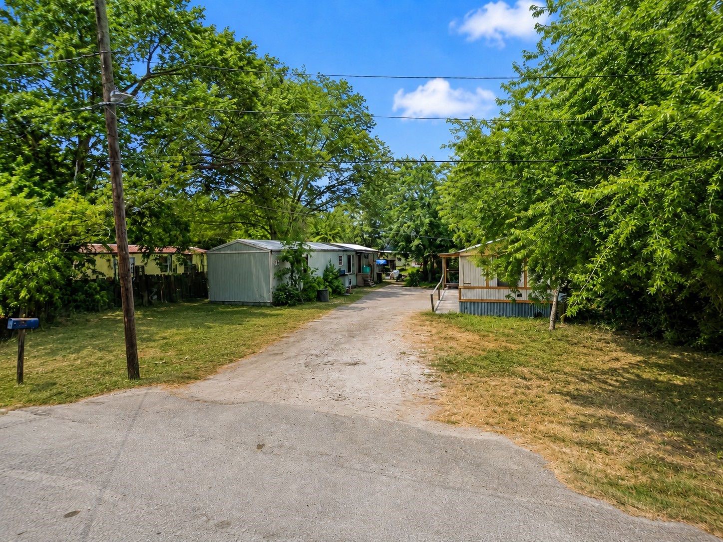The property offers ample exterior space, convenient access from the street, and a spacious layout suitable for parking, storage, or outdoor use.