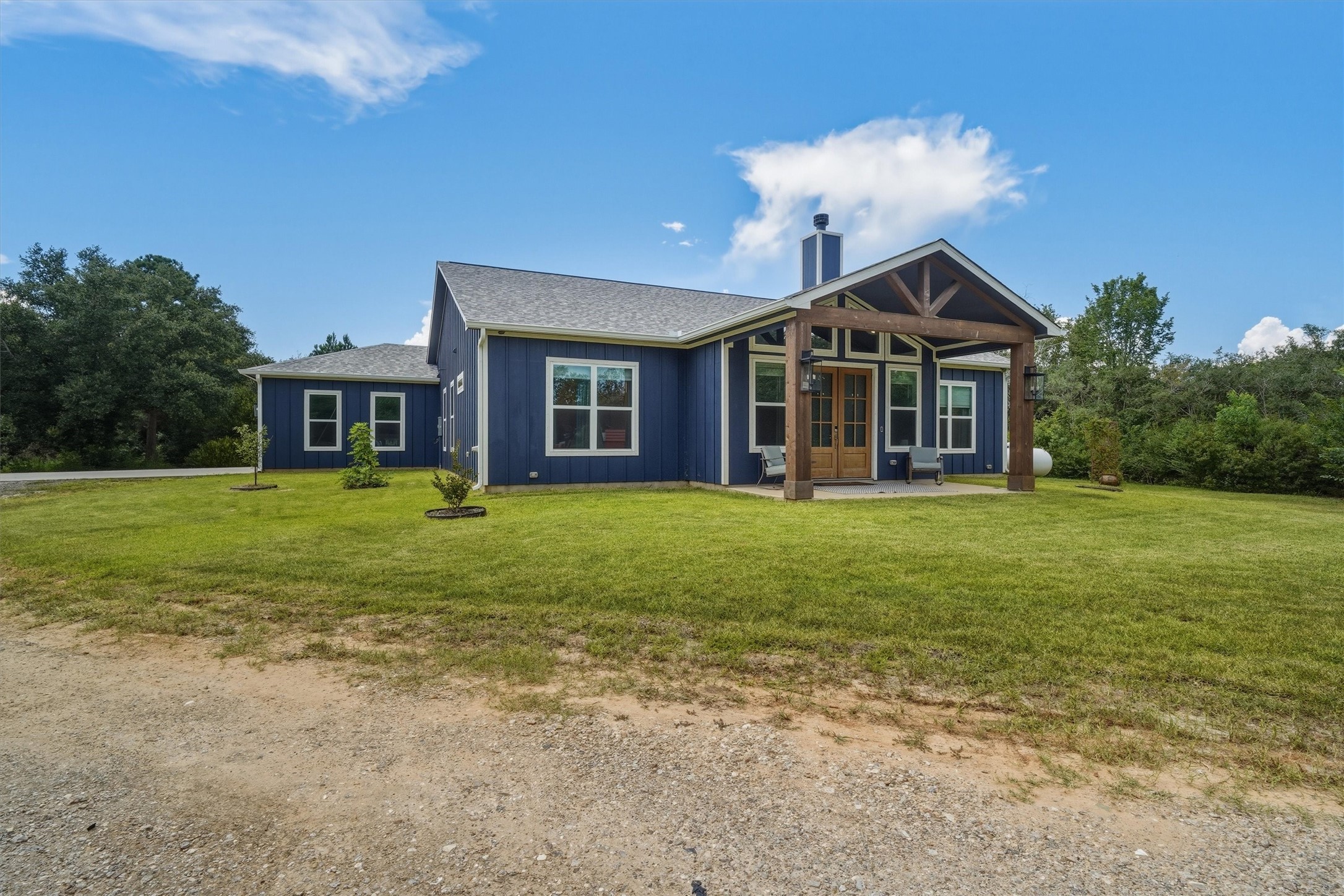 Sodded front and back yard, with mature trees, on two acres!