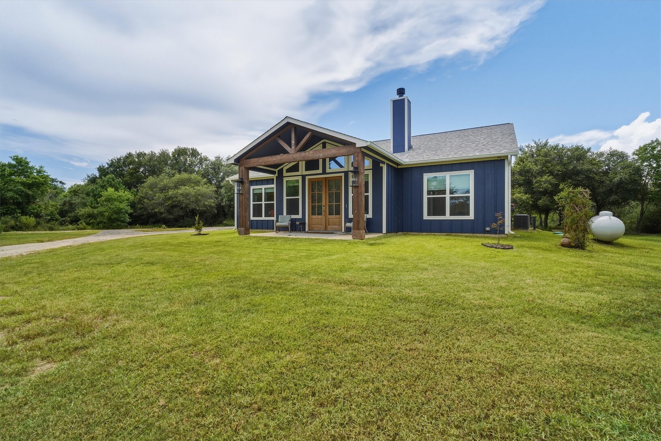 3/2/2 custom built in 2024, on 2 acres, complete with circle drive and RV hook up!