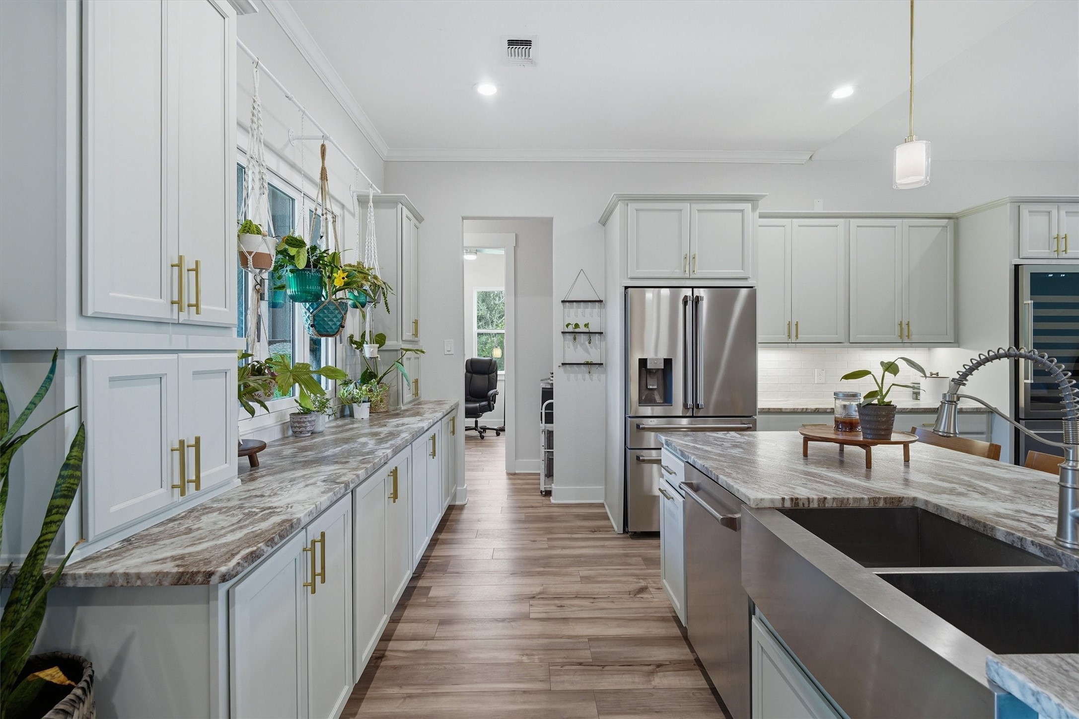 A chefs dream! Plenty of leathered granite countertop space and plenty of storage, stainless steel appliances.