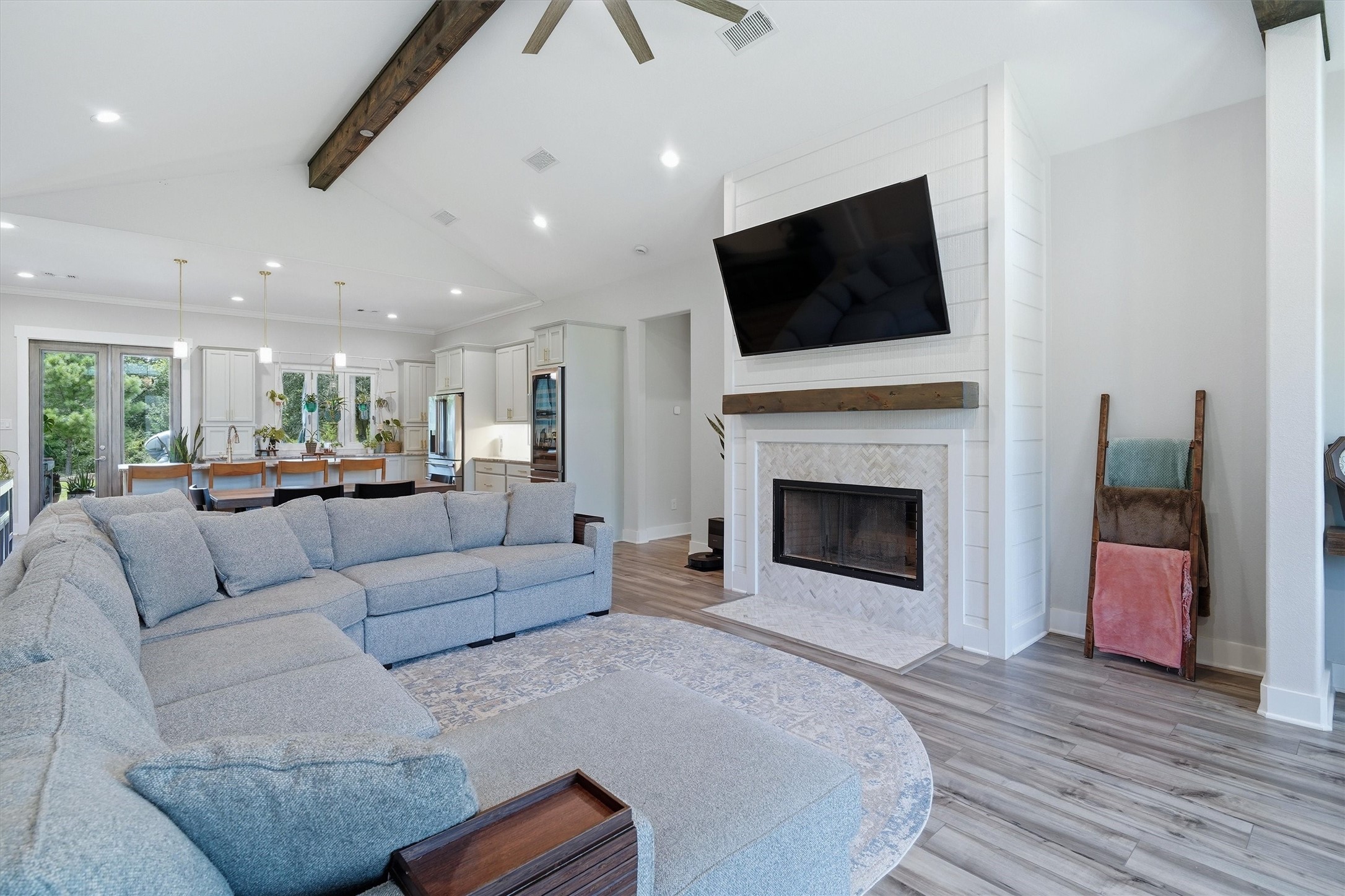 Open floorplan! Wall of windows offers a picturesque view of the property
