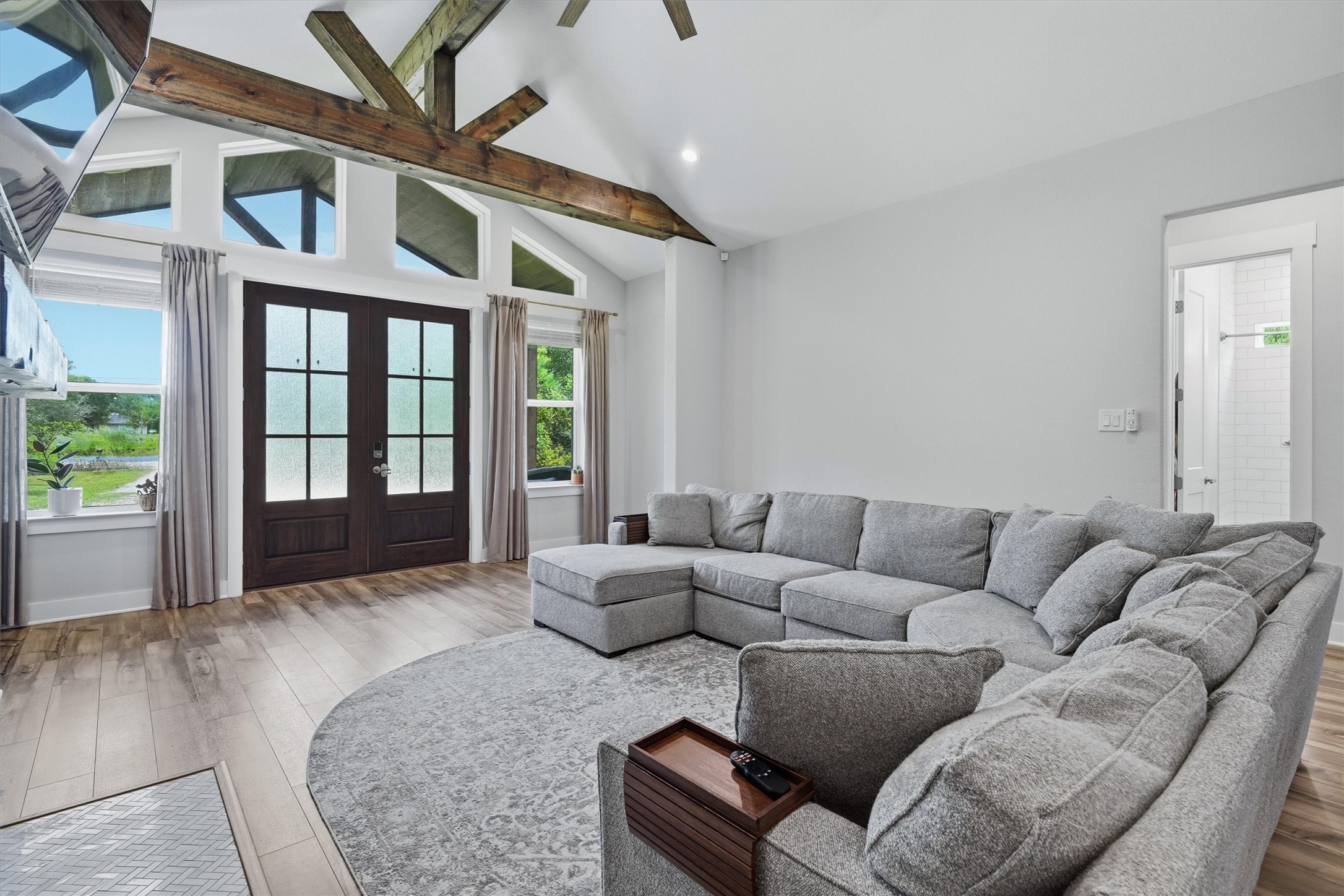 Stunning double front doors, custom beam at the entry. Fresh paint and LVP floors throughout