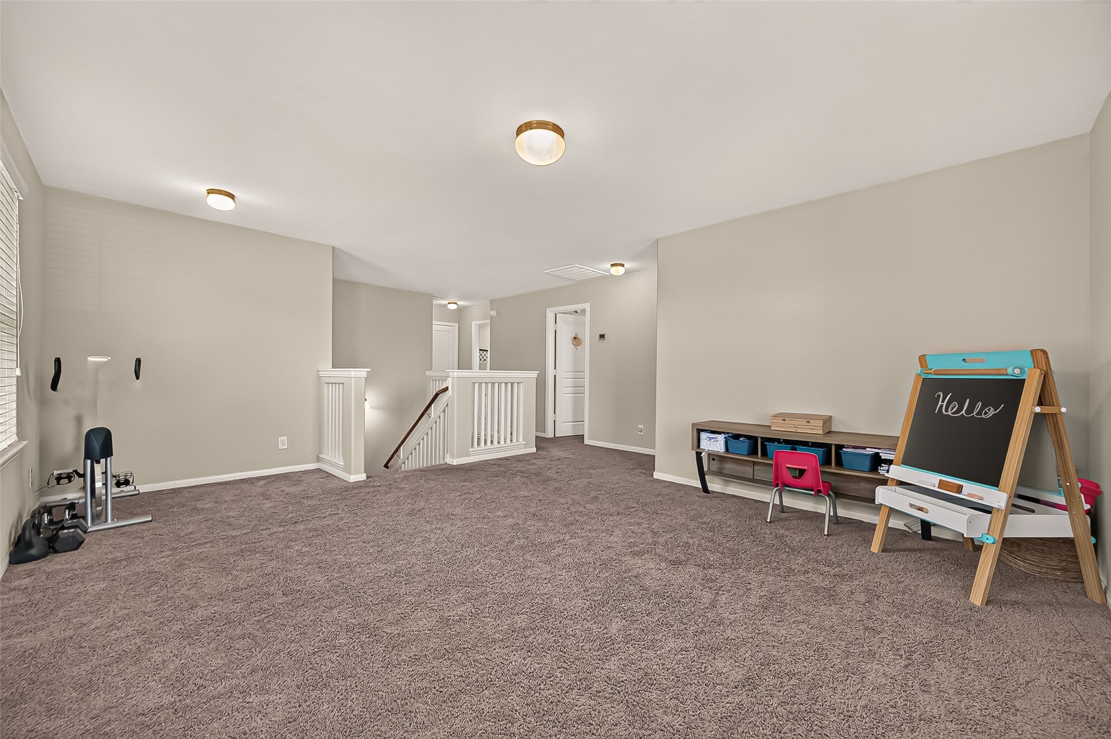 Lots of space for a tv room, games, or a functional work space.