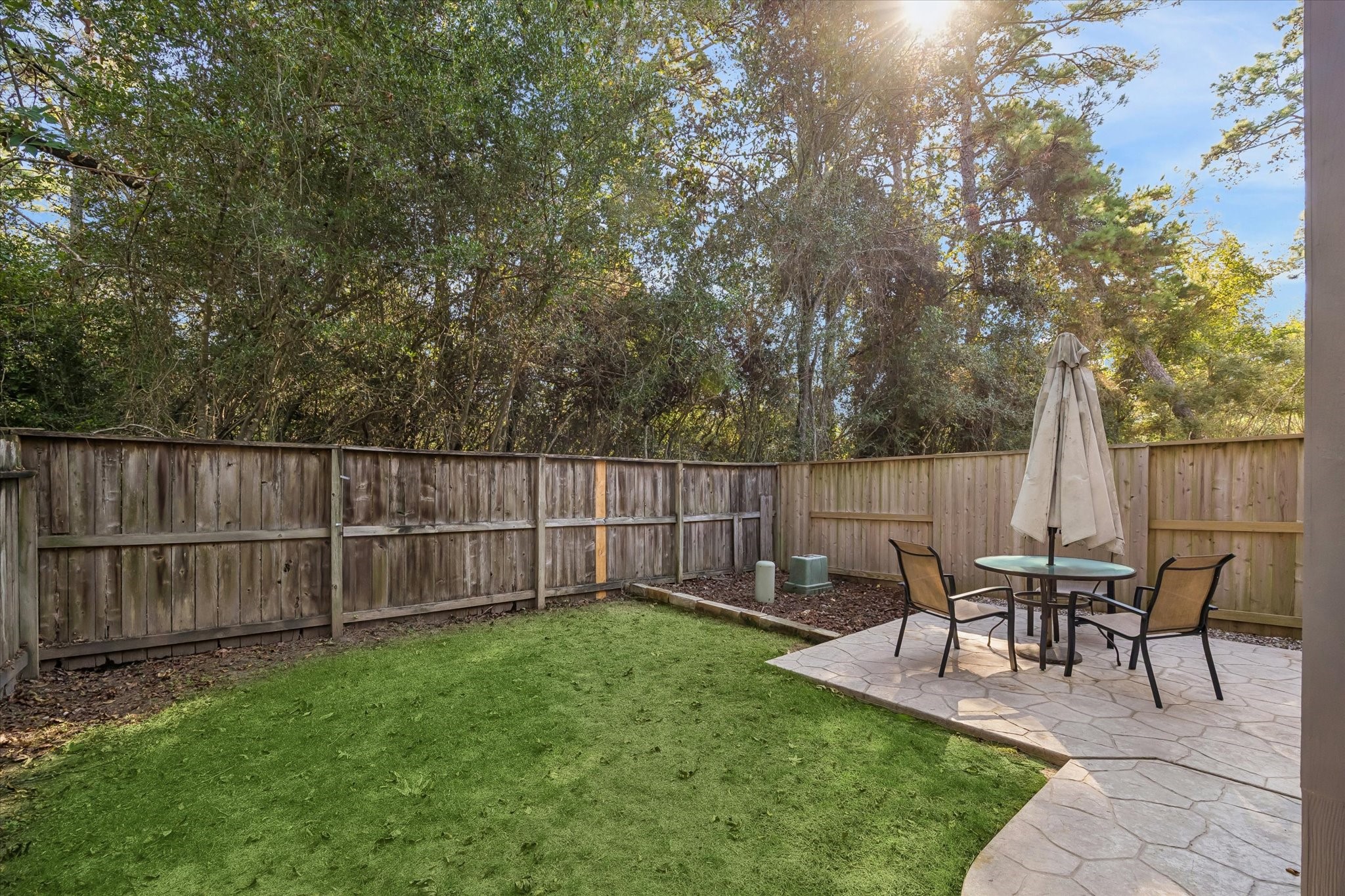Wonderful green backyard space with extensive patio. Fully fenced.