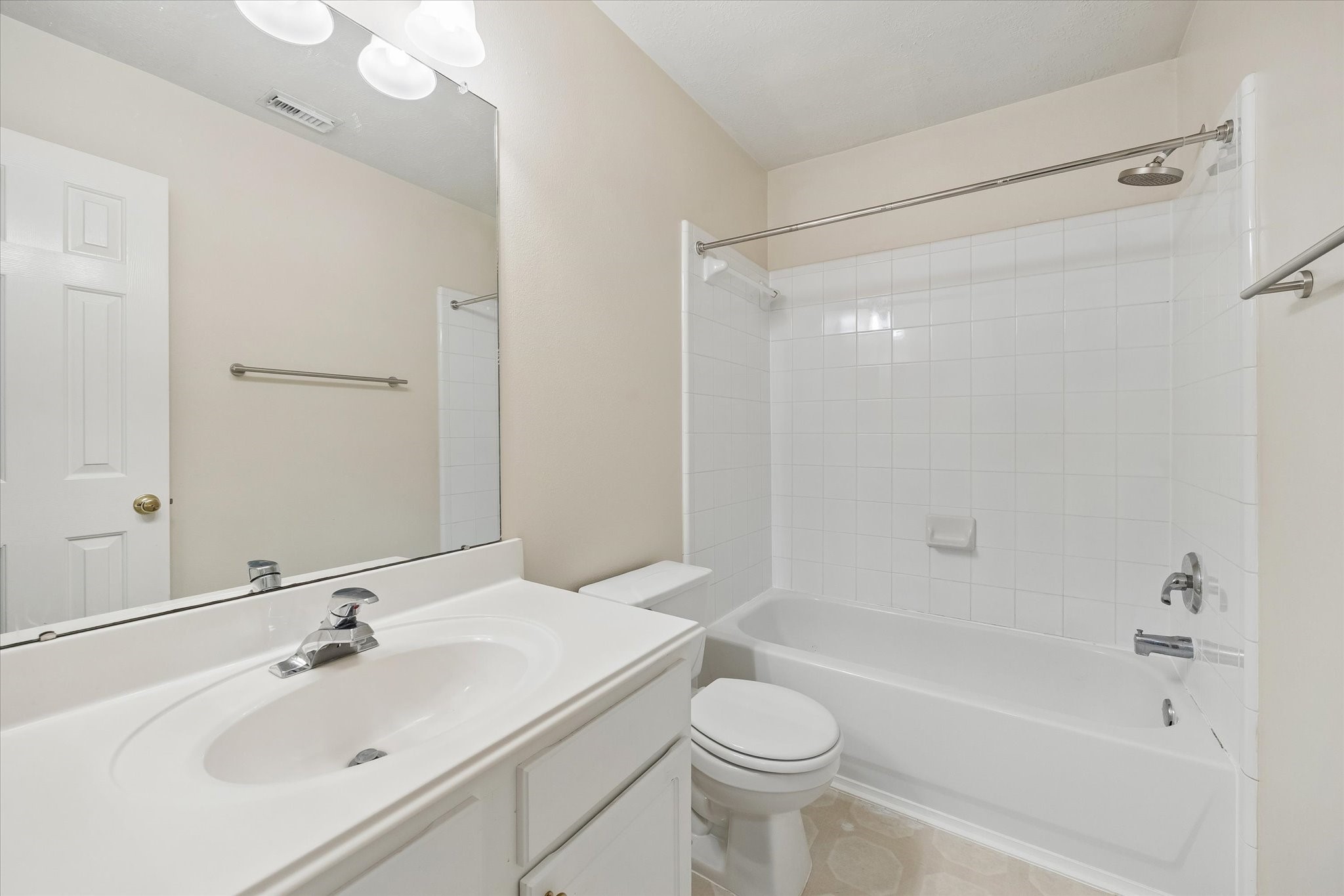 Secondary bath upstairs.