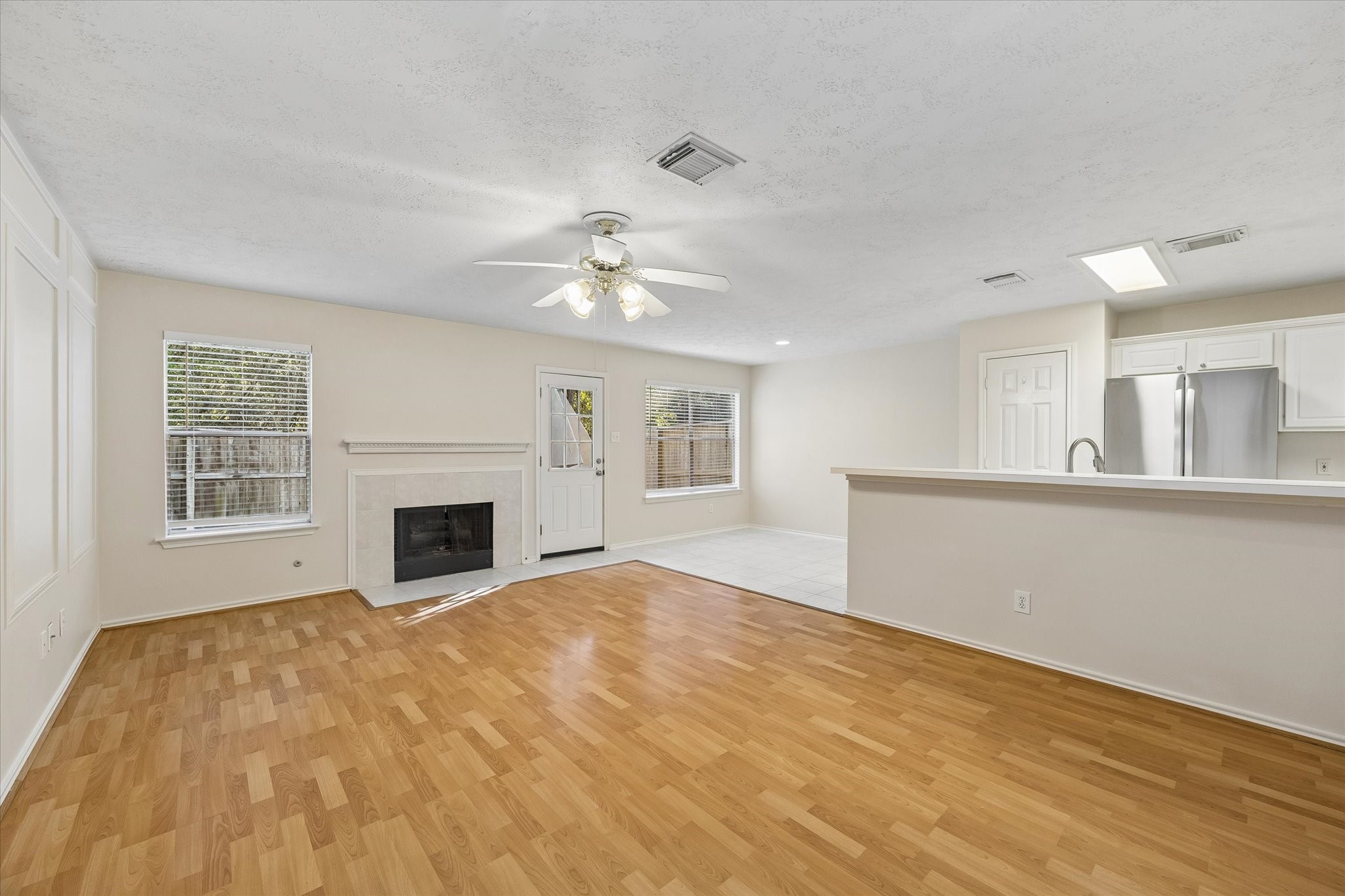 Open plan with breakfast area and inviting family room.