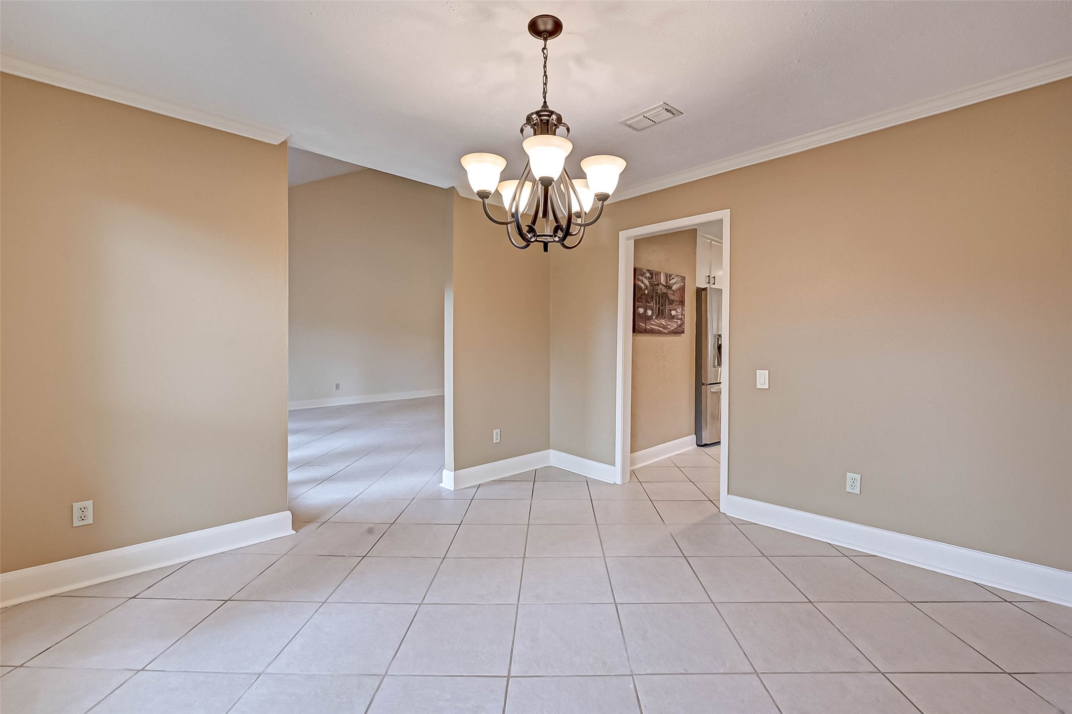 Formal dining room. has windows overlooking back yard.