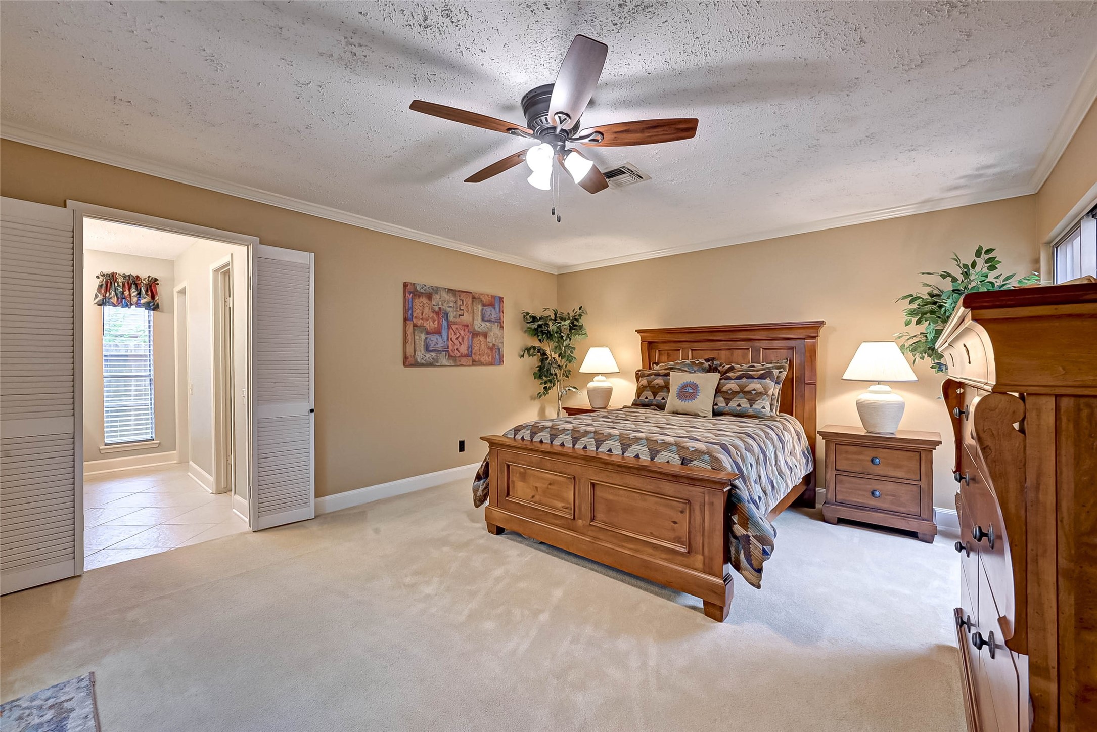 Large primary bedroom has attached bath. (It is no longer furnished.)