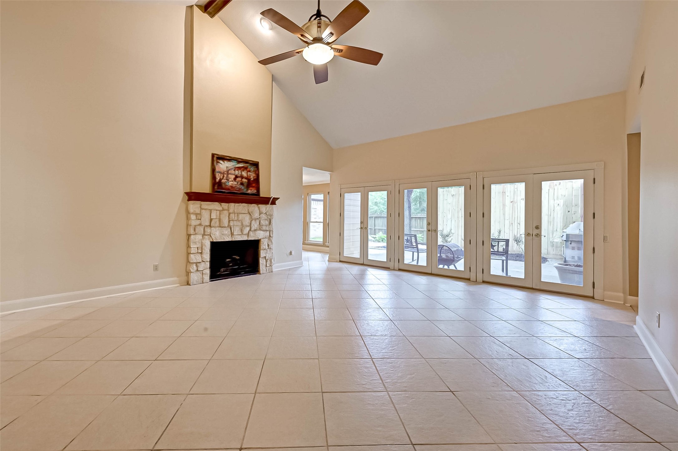 Family room with a dramatic vaulted ceiling.
