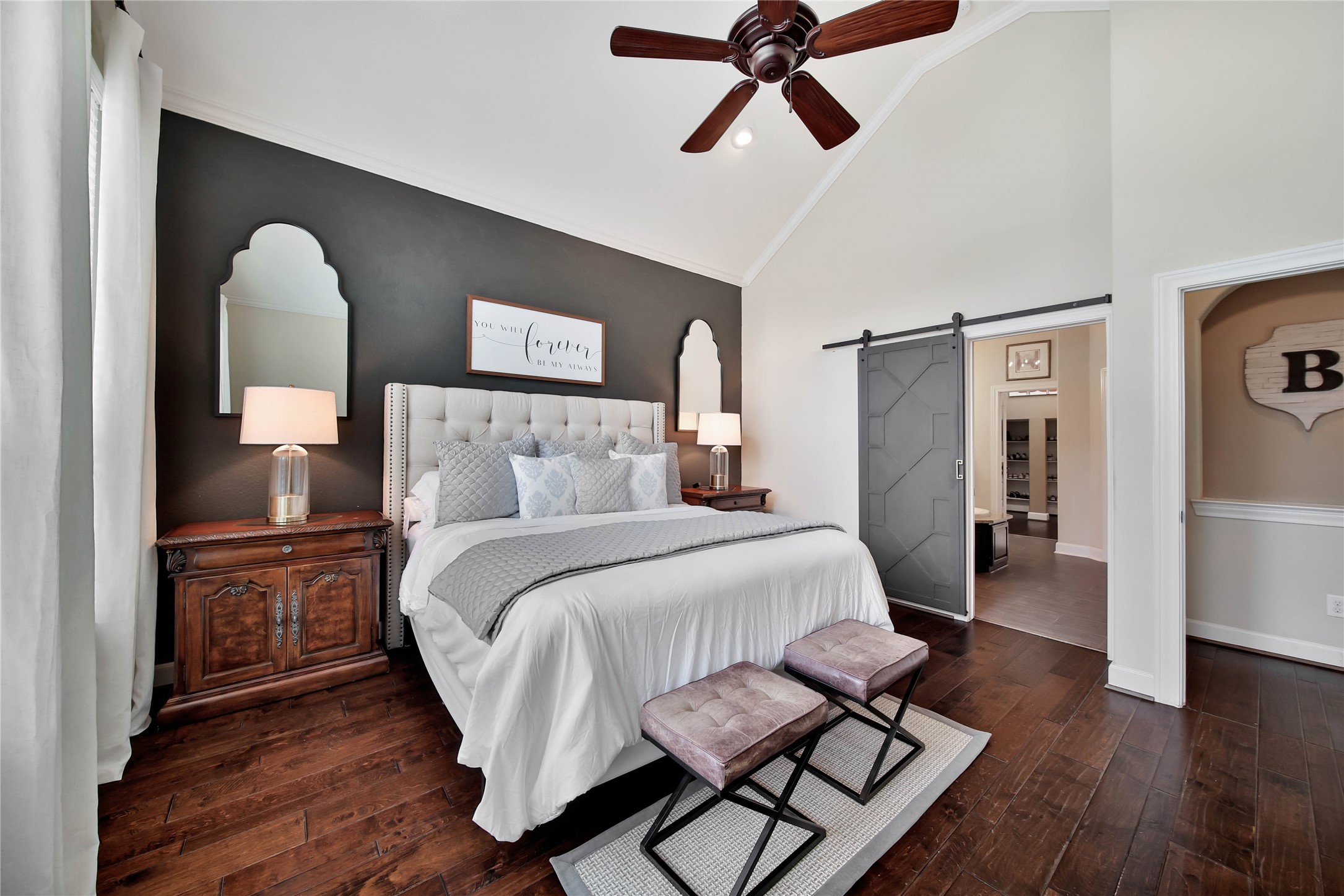 The primary suite is a wonderful escape for two, offering a peaceful retreat to relax, unwind, and recharge.